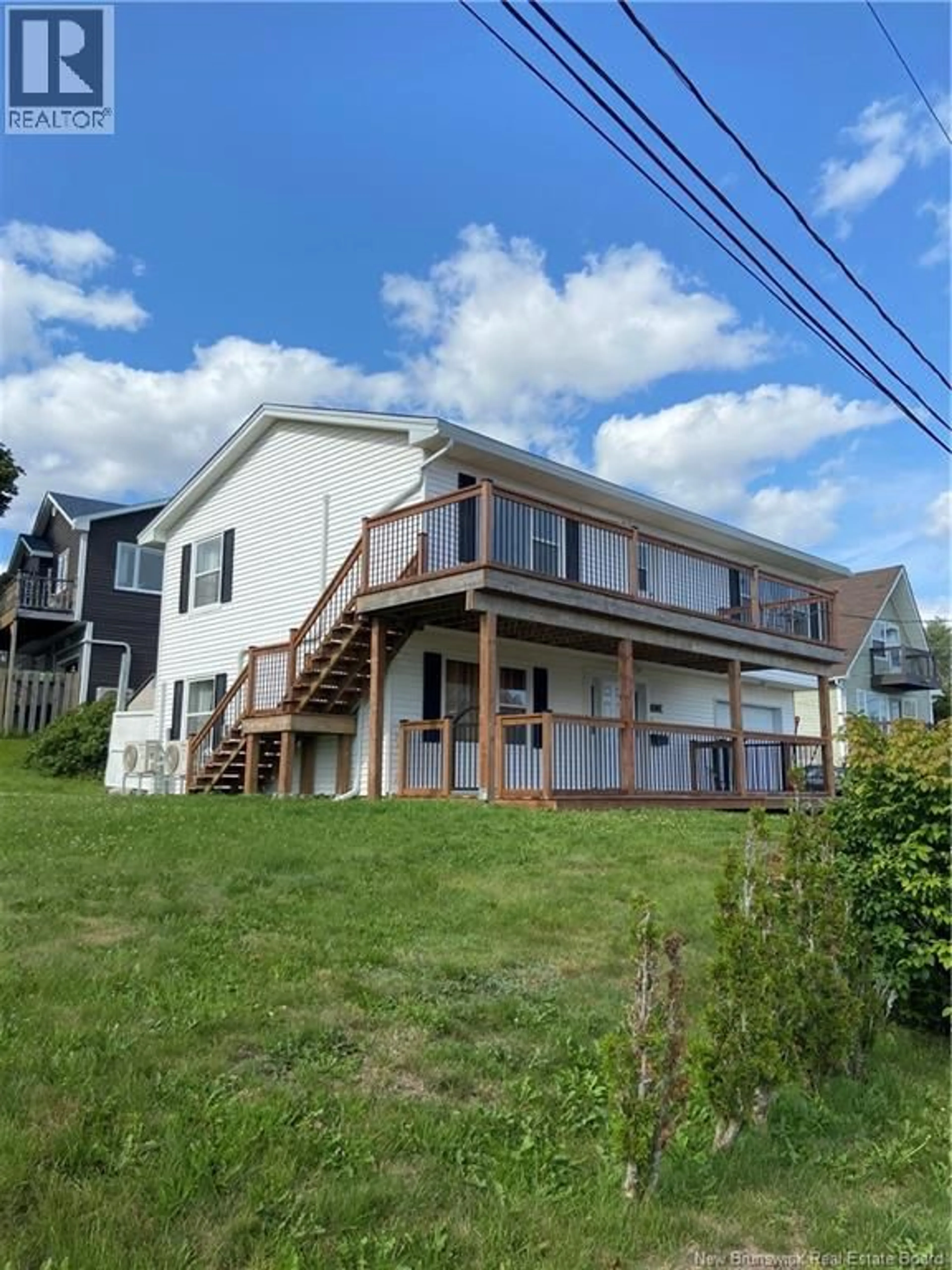 A pic from outside/outdoor area/front of a property/back of a property/a pic from drone, water/lake/river/ocean view for 1 WALSH PLACE, Saint John New Brunswick E2M3B2