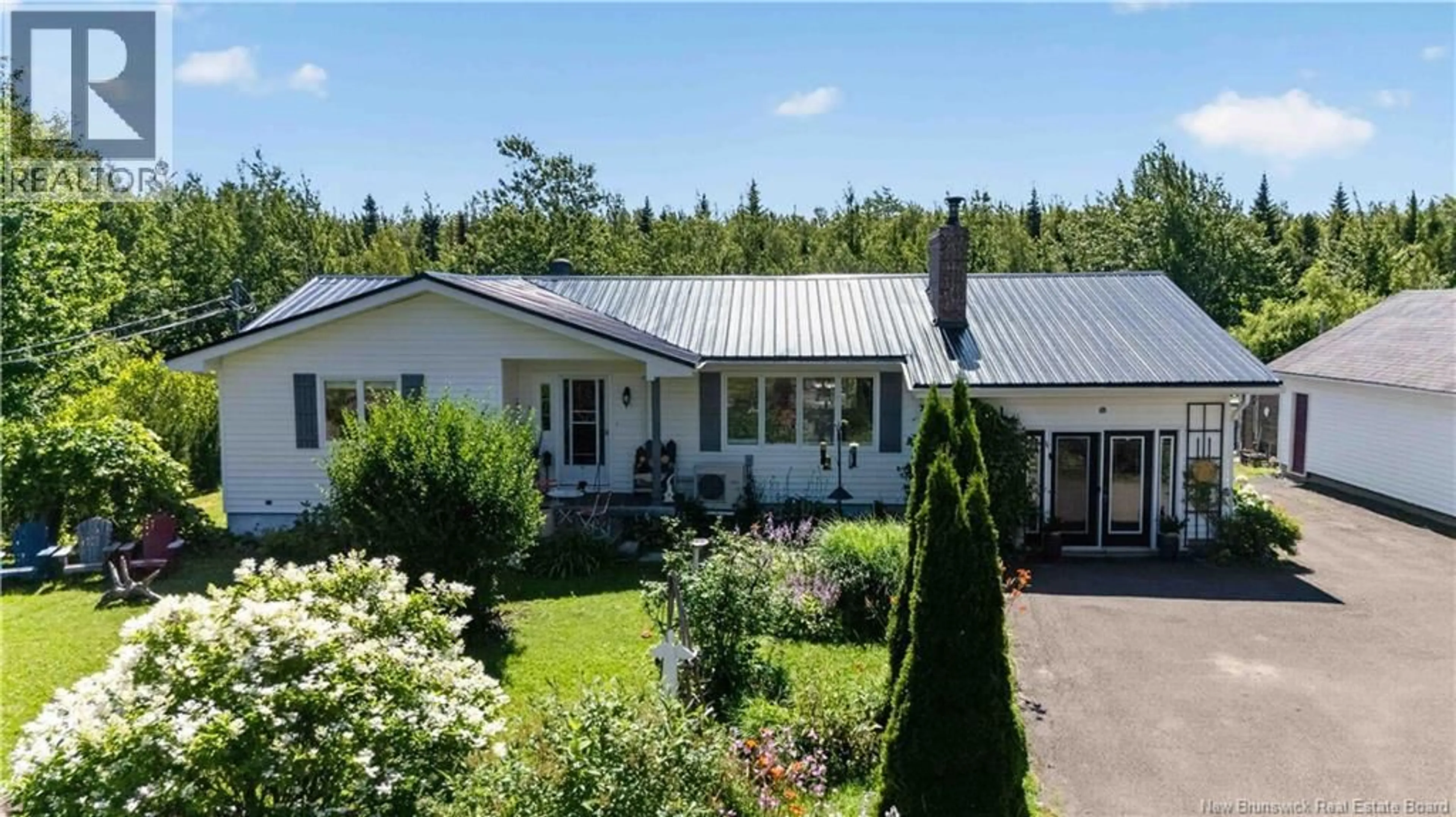 A pic from outside/outdoor area/front of a property/back of a property/a pic from drone, unknown for 2997 ROUTE 115, Irishtown New Brunswick E1H3K3