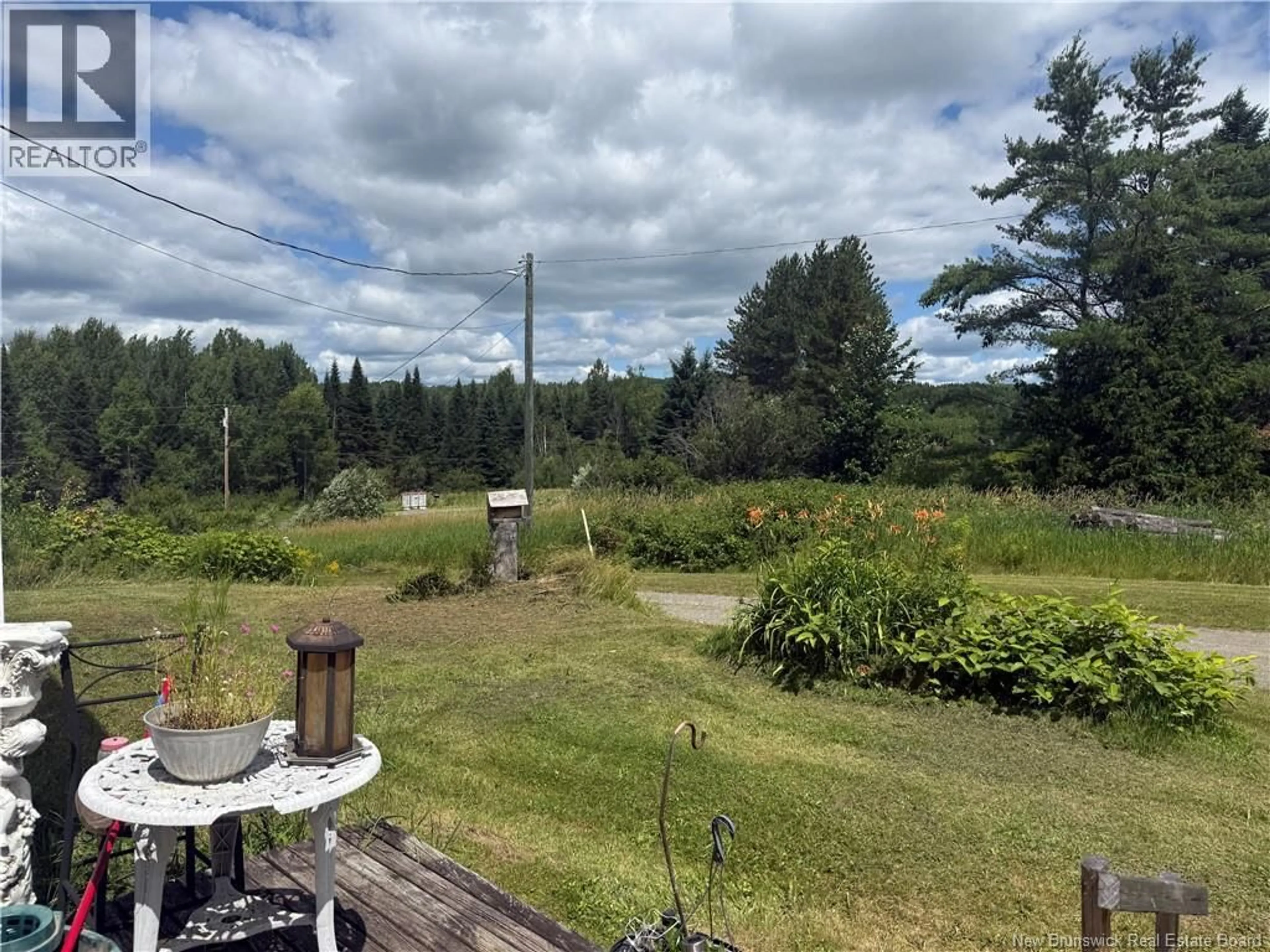 A pic from outside/outdoor area/front of a property/back of a property/a pic from drone, water/lake/river/ocean view for 120 CHURCHLAND, Tilley New Brunswick E7H1S3