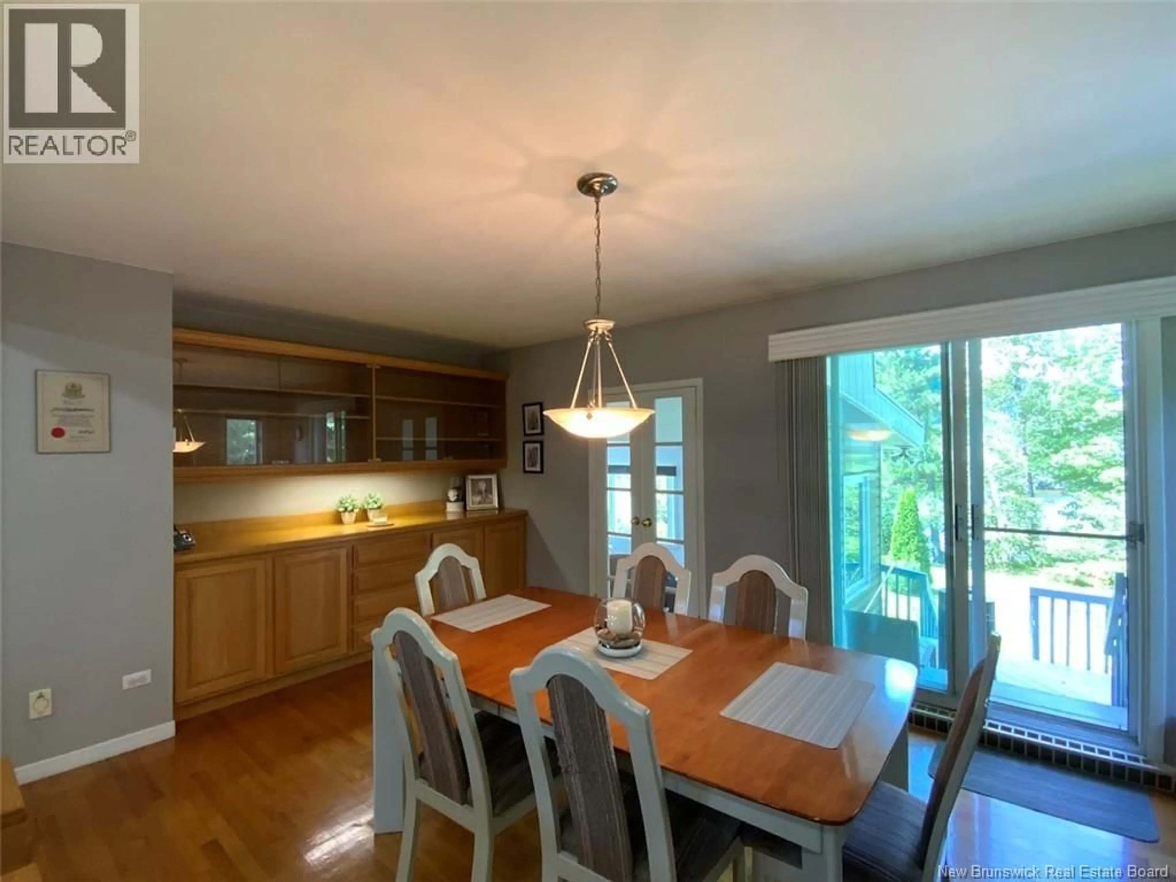 Dining room, wood/laminate floor for 11 LEBLOND STREET, Edmundston New Brunswick E3V4K9