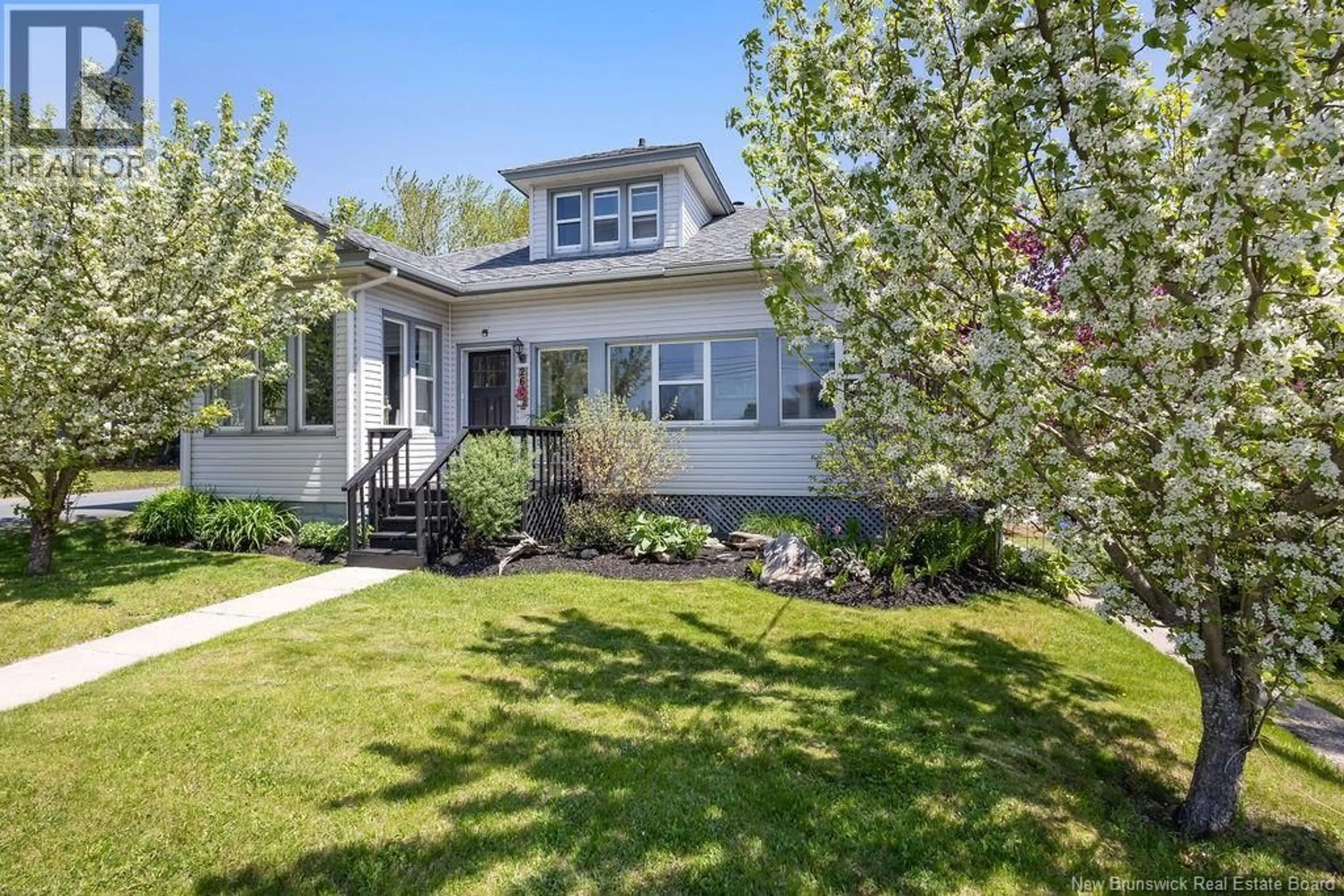 Home with vinyl exterior material, street for 260 RADIO STREET, Miramichi New Brunswick E1V2W5