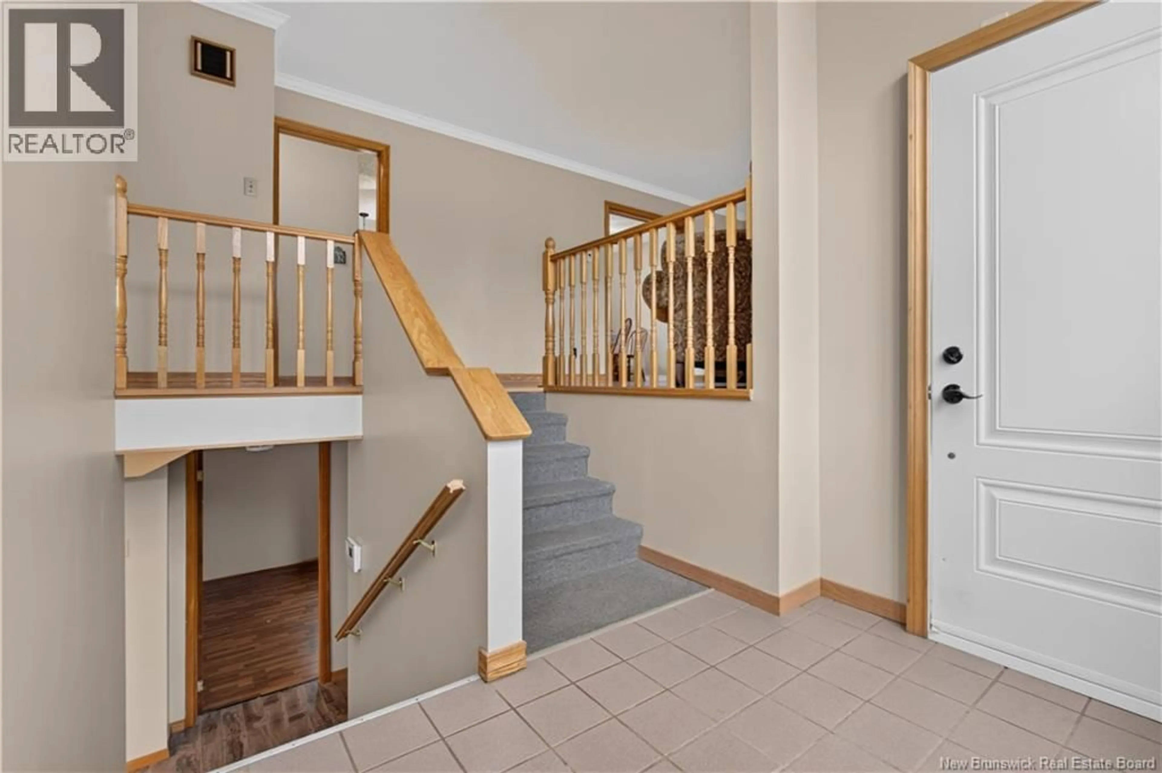 Indoor foyer for 18 LOBBAN AVENUE, Miramichi New Brunswick E1N2W5