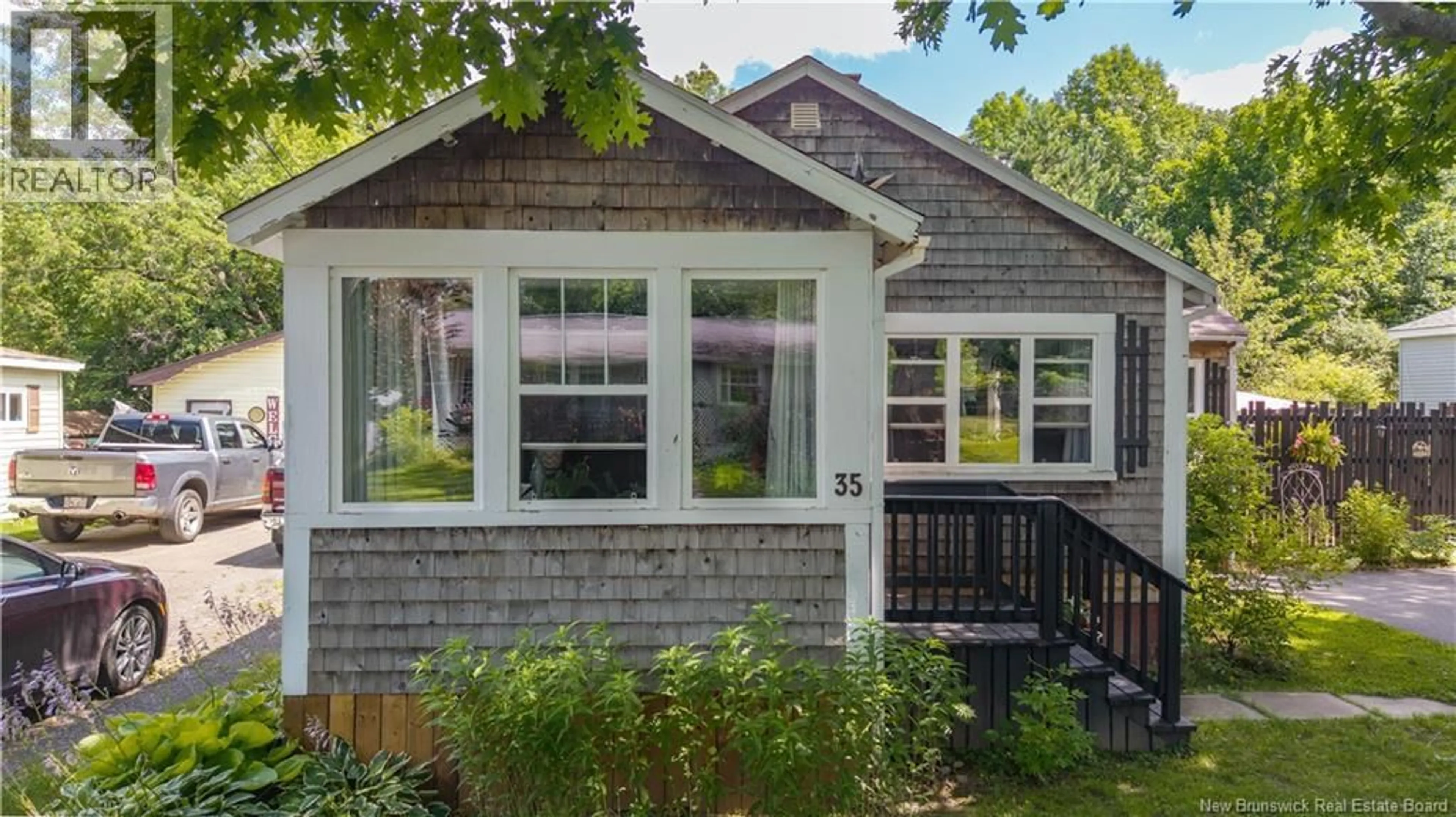 Home with vinyl exterior material, street for 35 HILL STREET, St. Stephen New Brunswick E3L1N6