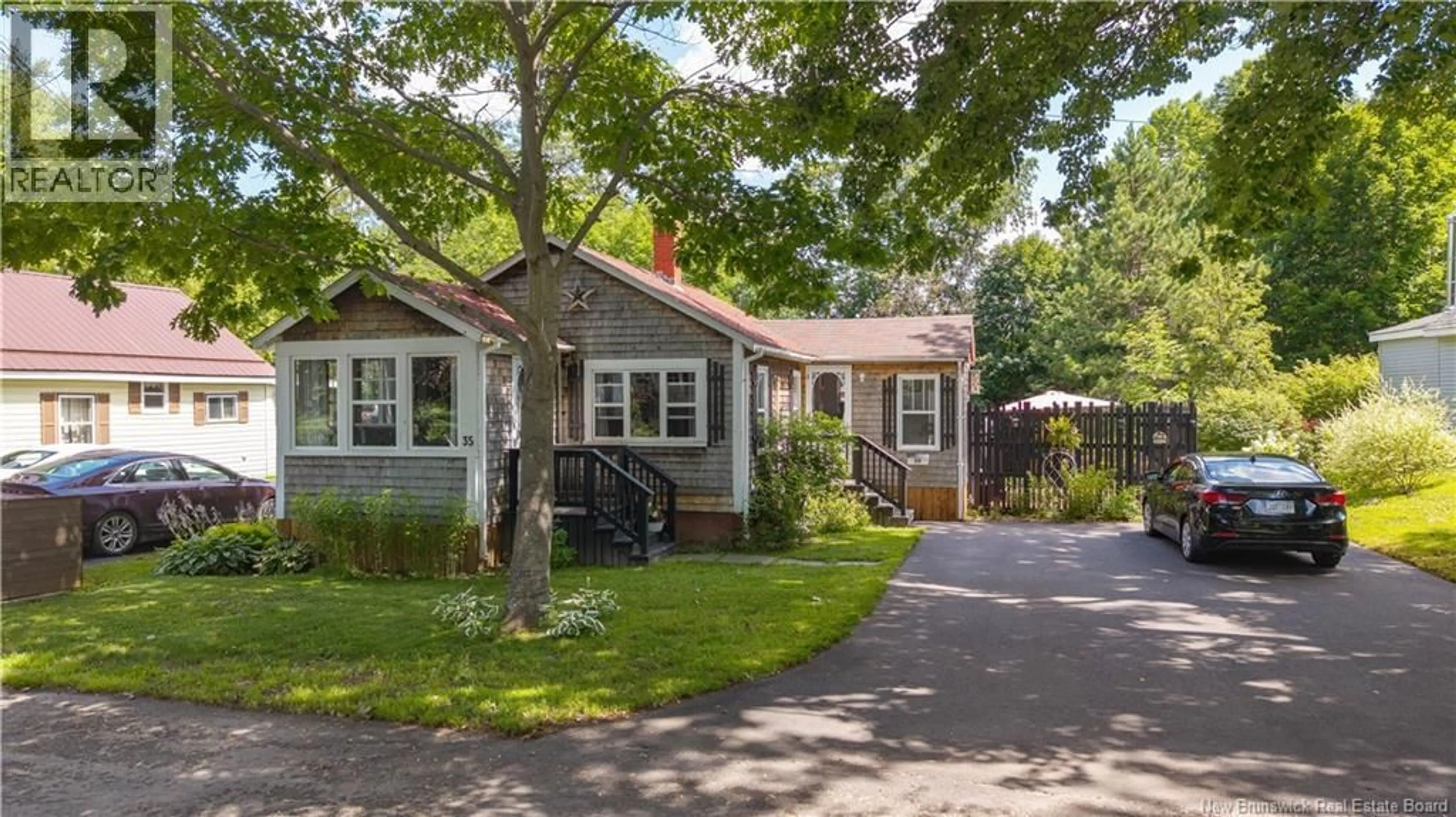 Home with vinyl exterior material, street for 35 HILL STREET, St. Stephen New Brunswick E3L1N6