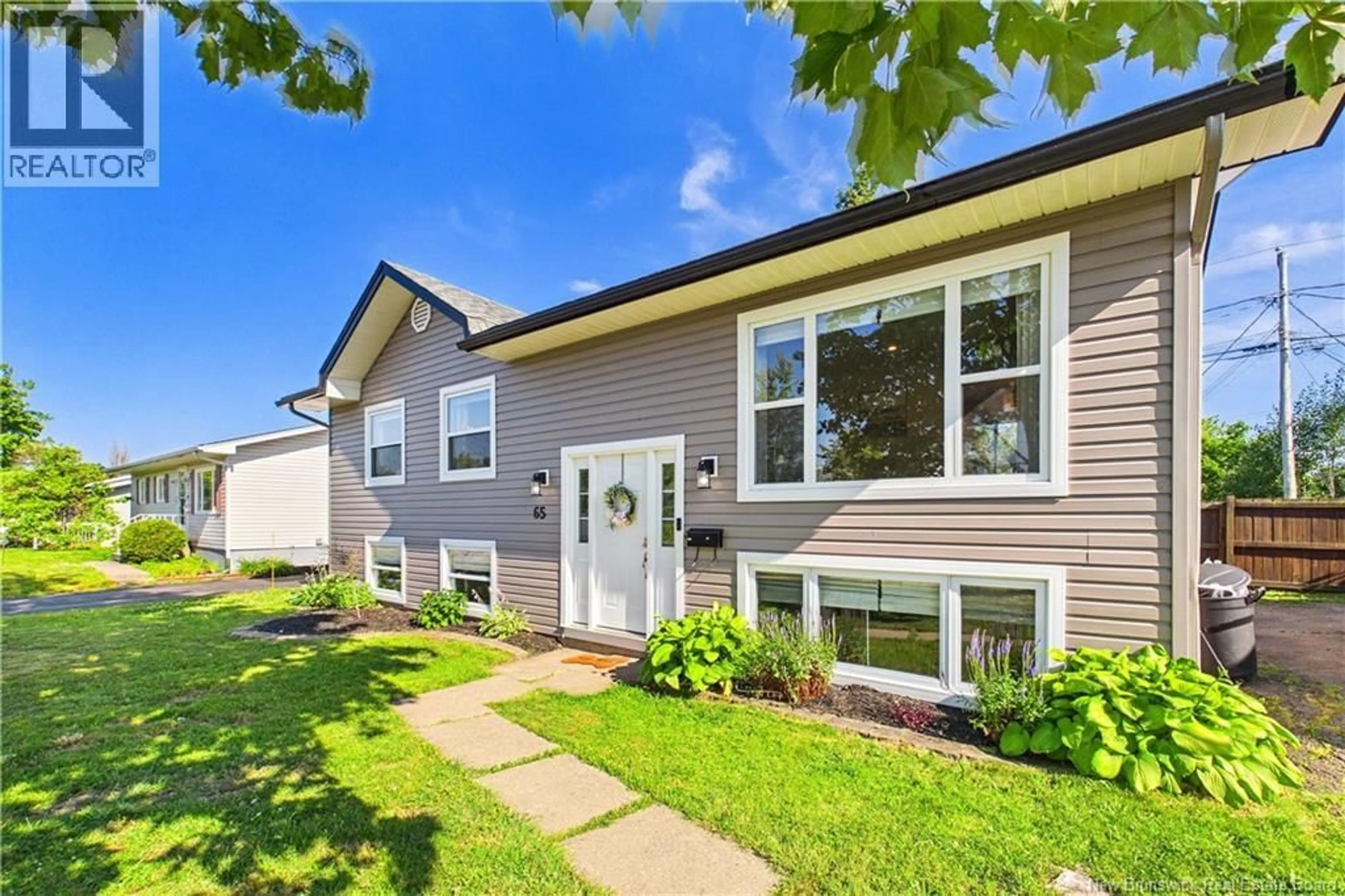 Home with vinyl exterior material, street for 65 SATINWOOD DRIVE, Moncton New Brunswick E1G1C3
