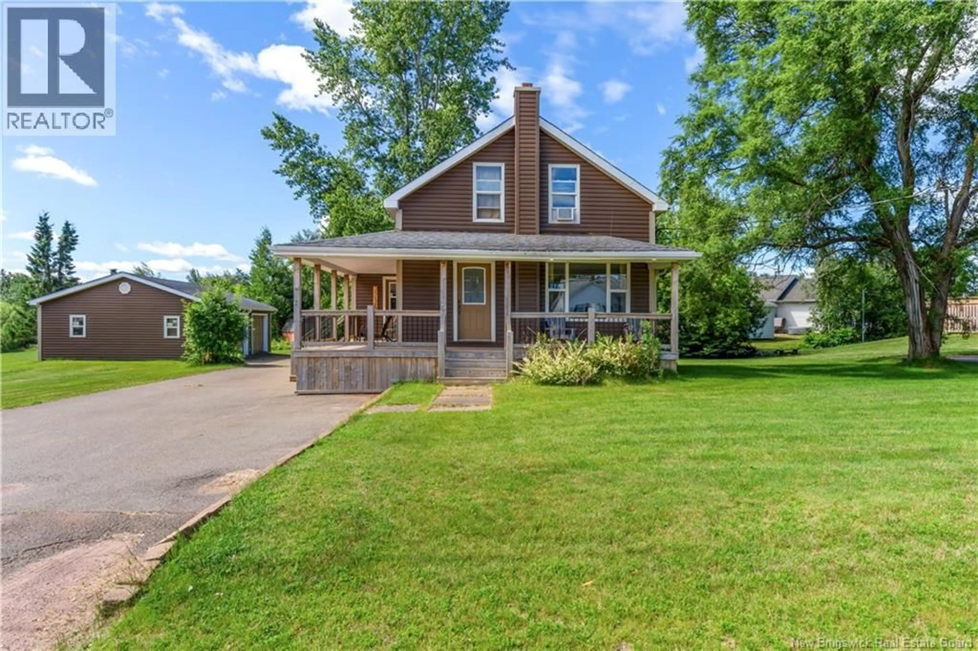 Home with vinyl exterior material, street for 2701 CH ACADIE, Cap-Pelé New Brunswick E4N1E5
