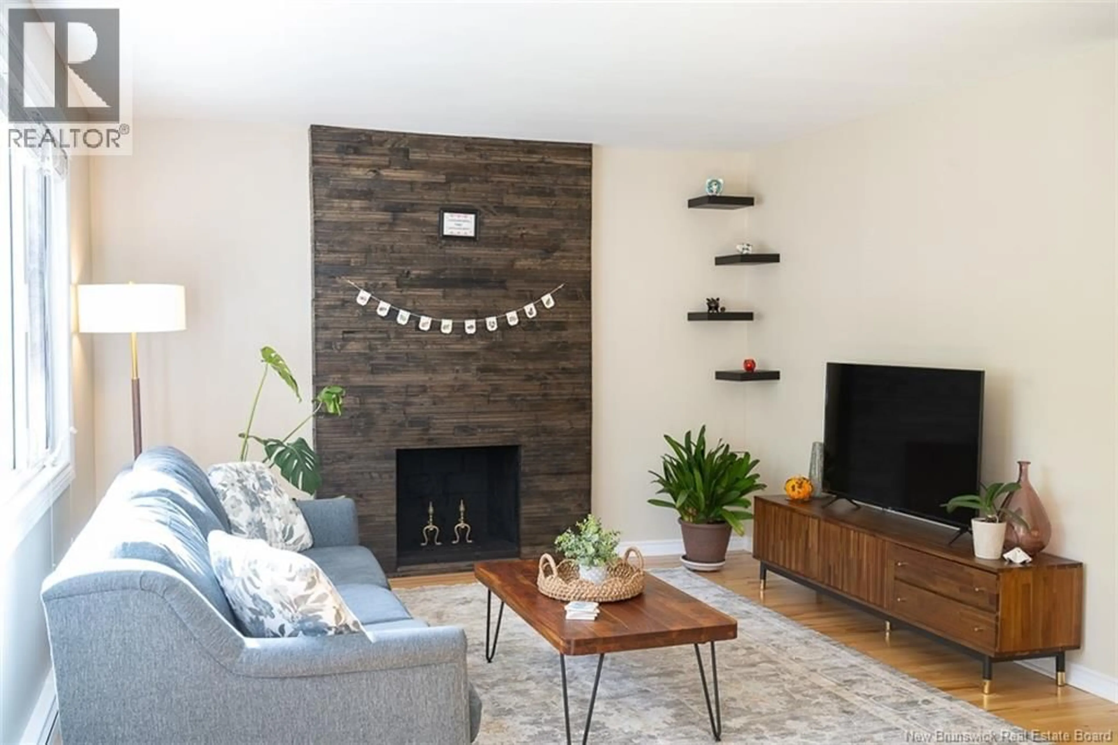 Living room with furniture, wood/laminate floor for 15 LORNE STREET, Fredericton New Brunswick E3B2Y6