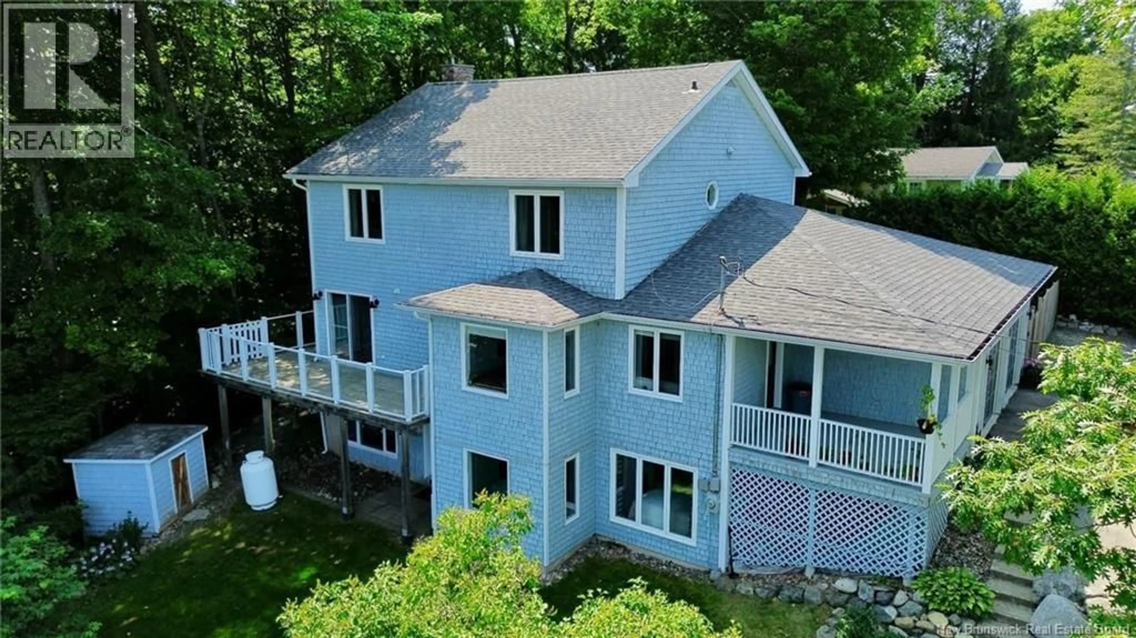 A pic from outside/outdoor area/front of a property/back of a property/a pic from drone, water/lake/river/ocean view for 117 WILSON STREET, Woodstock New Brunswick E7M3A2