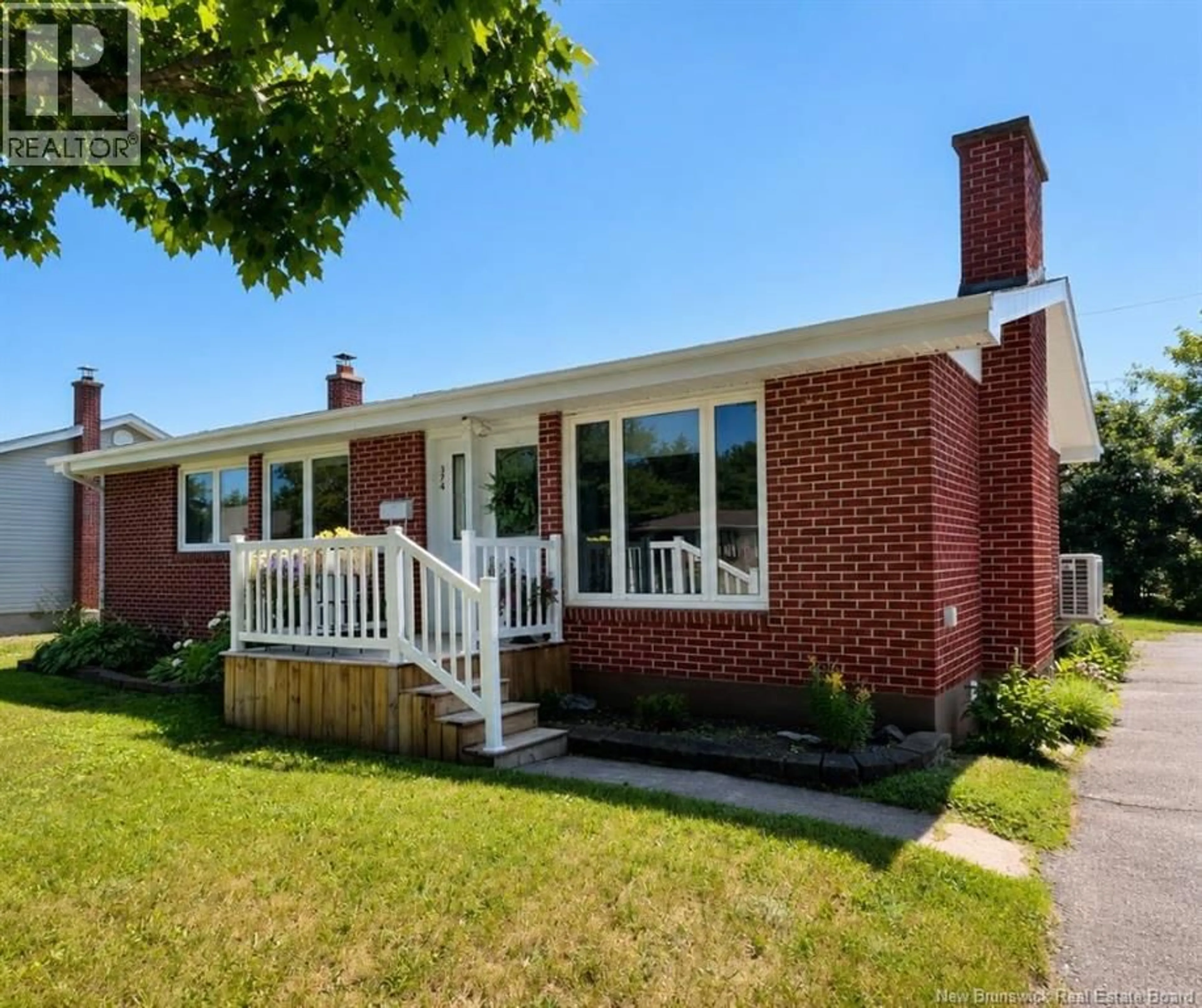 Home with brick exterior material, street for 374 MCKENNA AVENUE, Miramichi New Brunswick E1V1A8