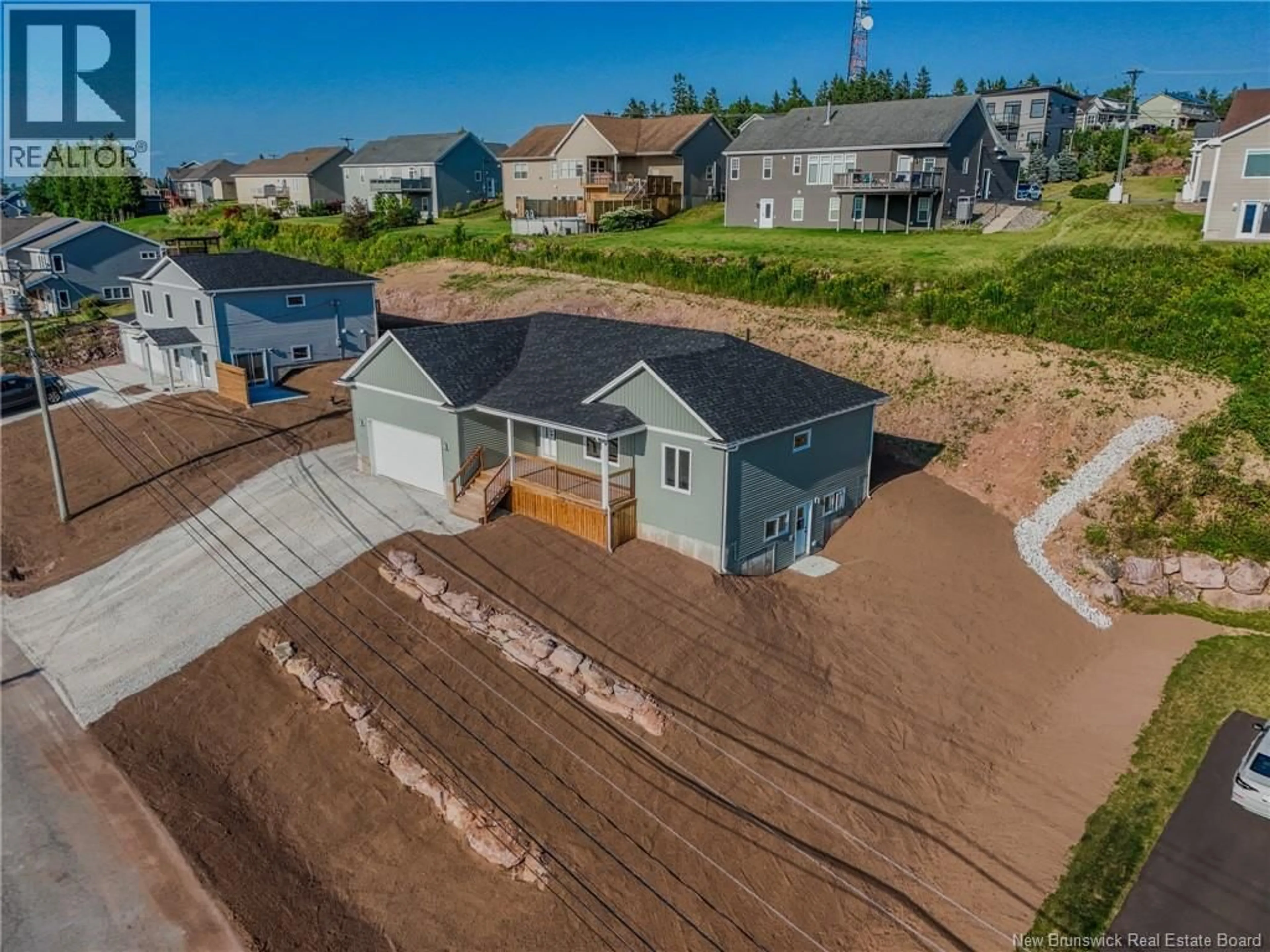 A pic from outside/outdoor area/front of a property/back of a property/a pic from drone, street for 72 SQUIRE DRIVE, Quispamsis New Brunswick E2G1C1