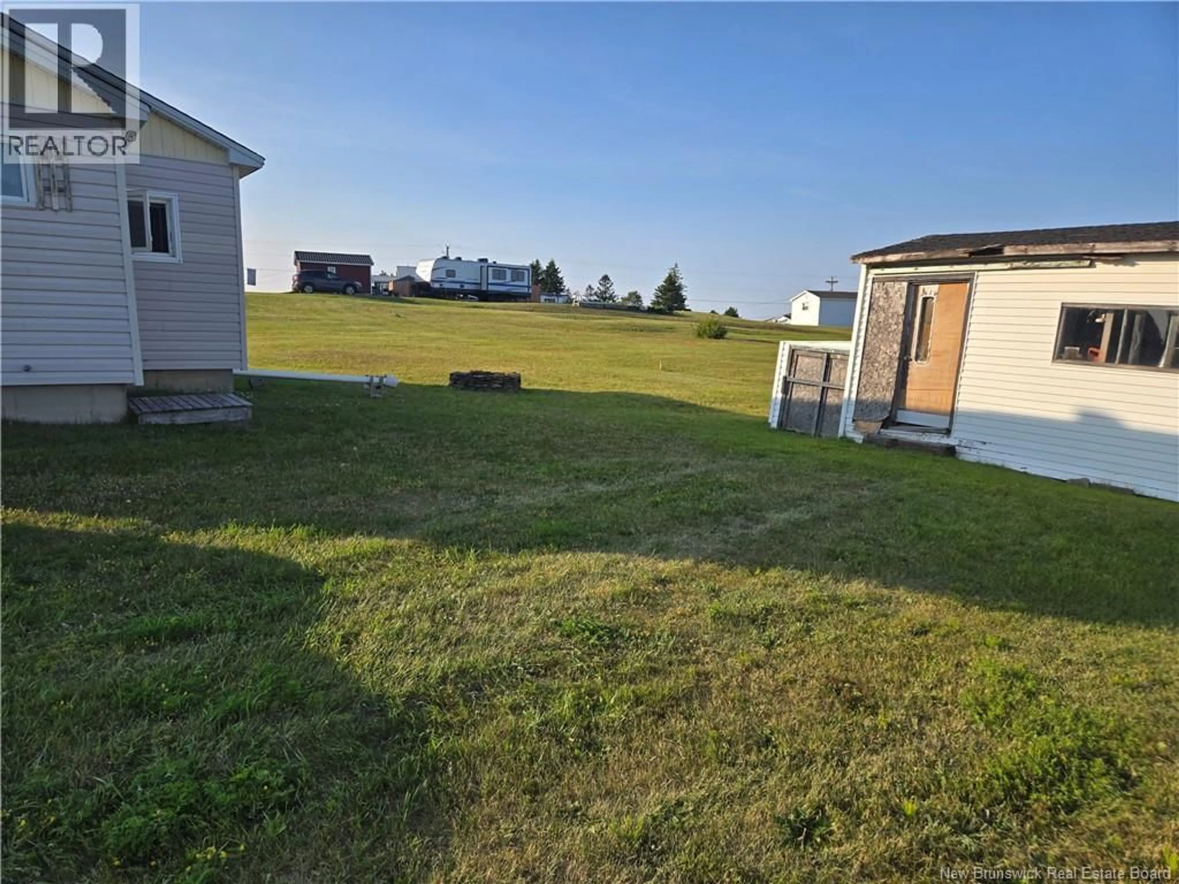 A pic from outside/outdoor area/front of a property/back of a property/a pic from drone, water/lake/river/ocean view for 2150 ROUTE 475, Bouctouche New Brunswick E4S4X1
