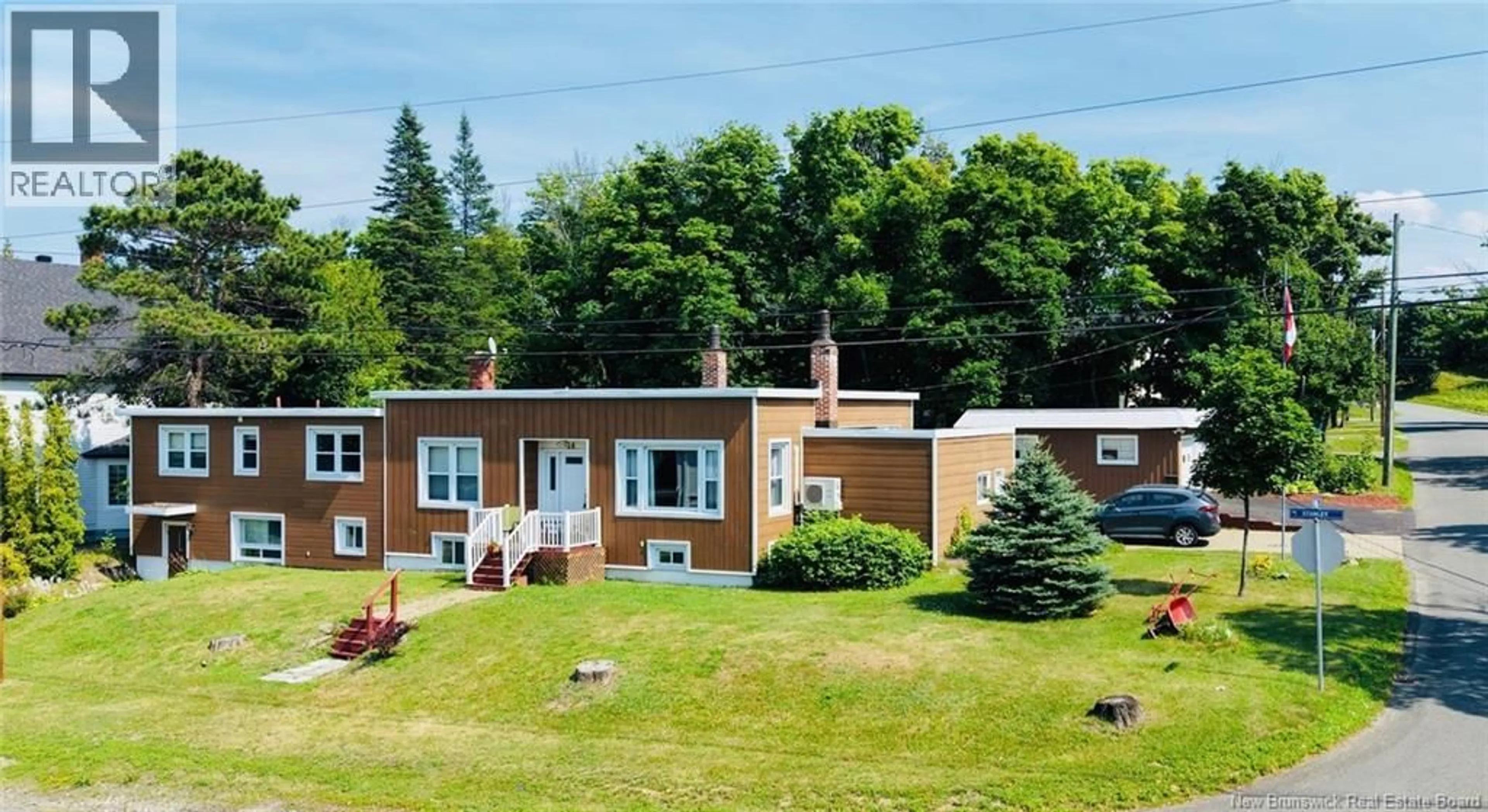 A pic from outside/outdoor area/front of a property/back of a property/a pic from drone, unknown for 14 STANLEY STREET, Campbellton New Brunswick E3N1G6