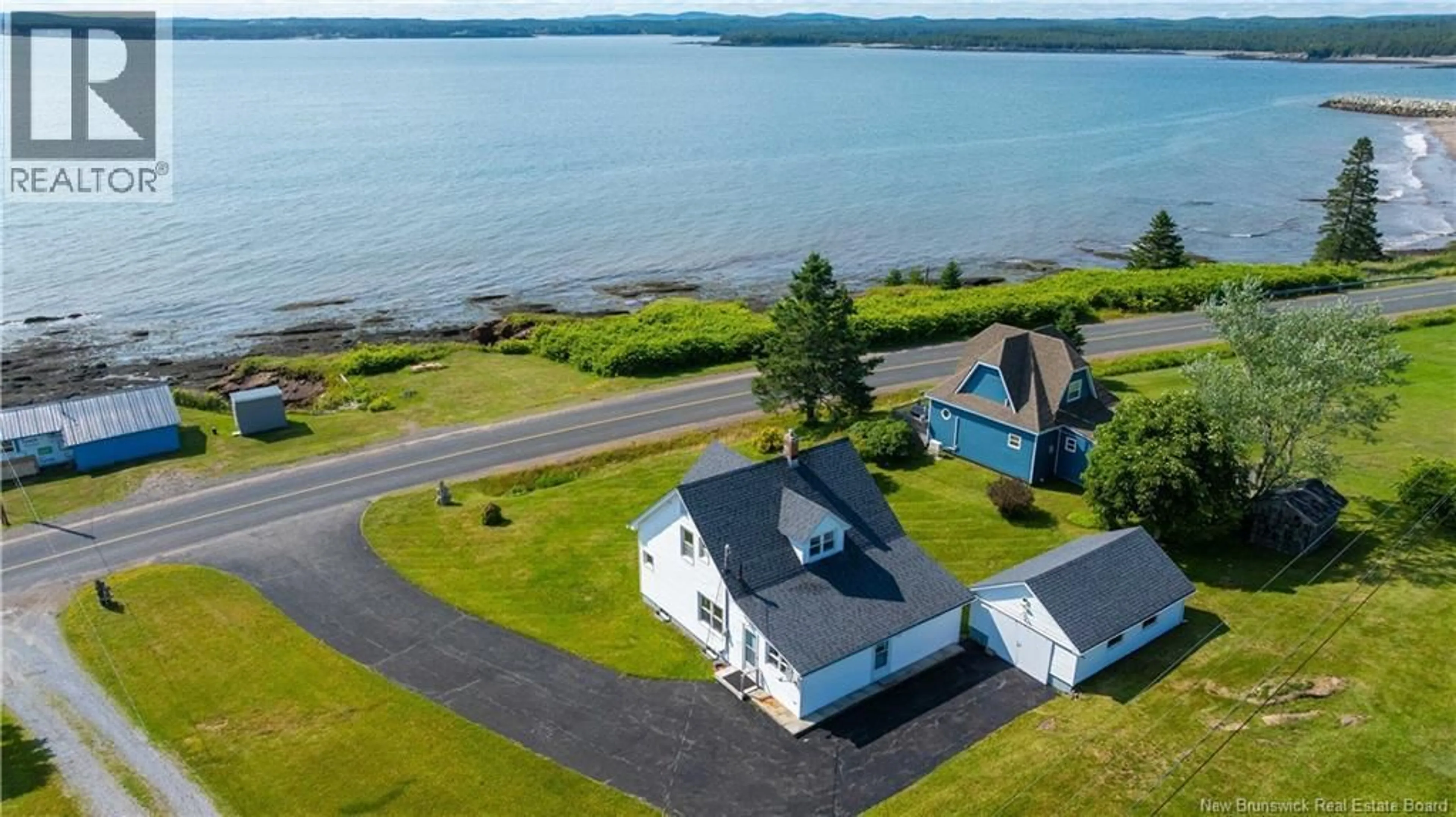 A pic from outside/outdoor area/front of a property/back of a property/a pic from drone, water/lake/river/ocean view for 243 MACES BAY ROAD, Maces Bay New Brunswick E5J1S8