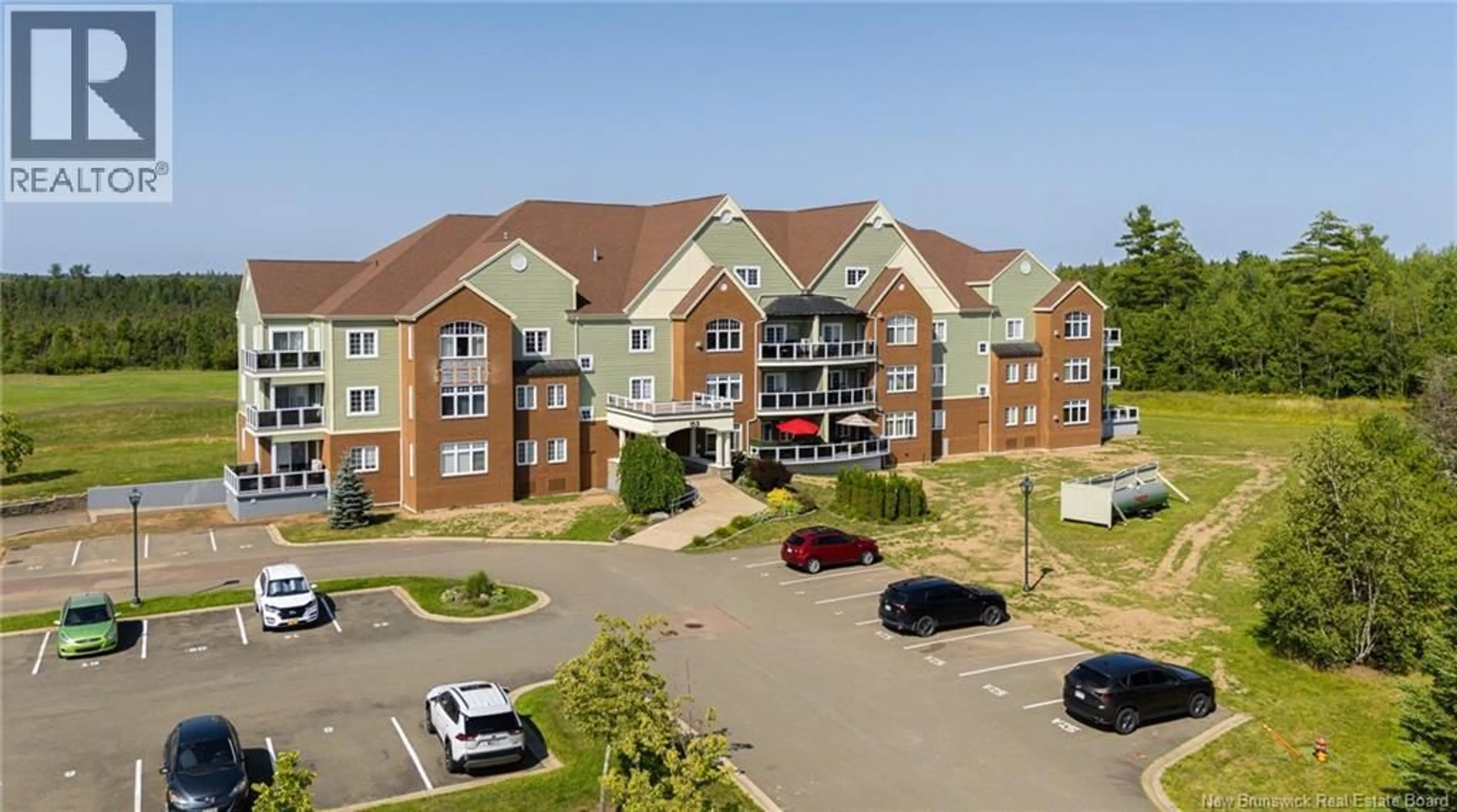 A pic from outside/outdoor area/front of a property/back of a property/a pic from drone, building for 208 - 163 ROYAL OAKS BOULEVARD, Moncton New Brunswick E1H2C7