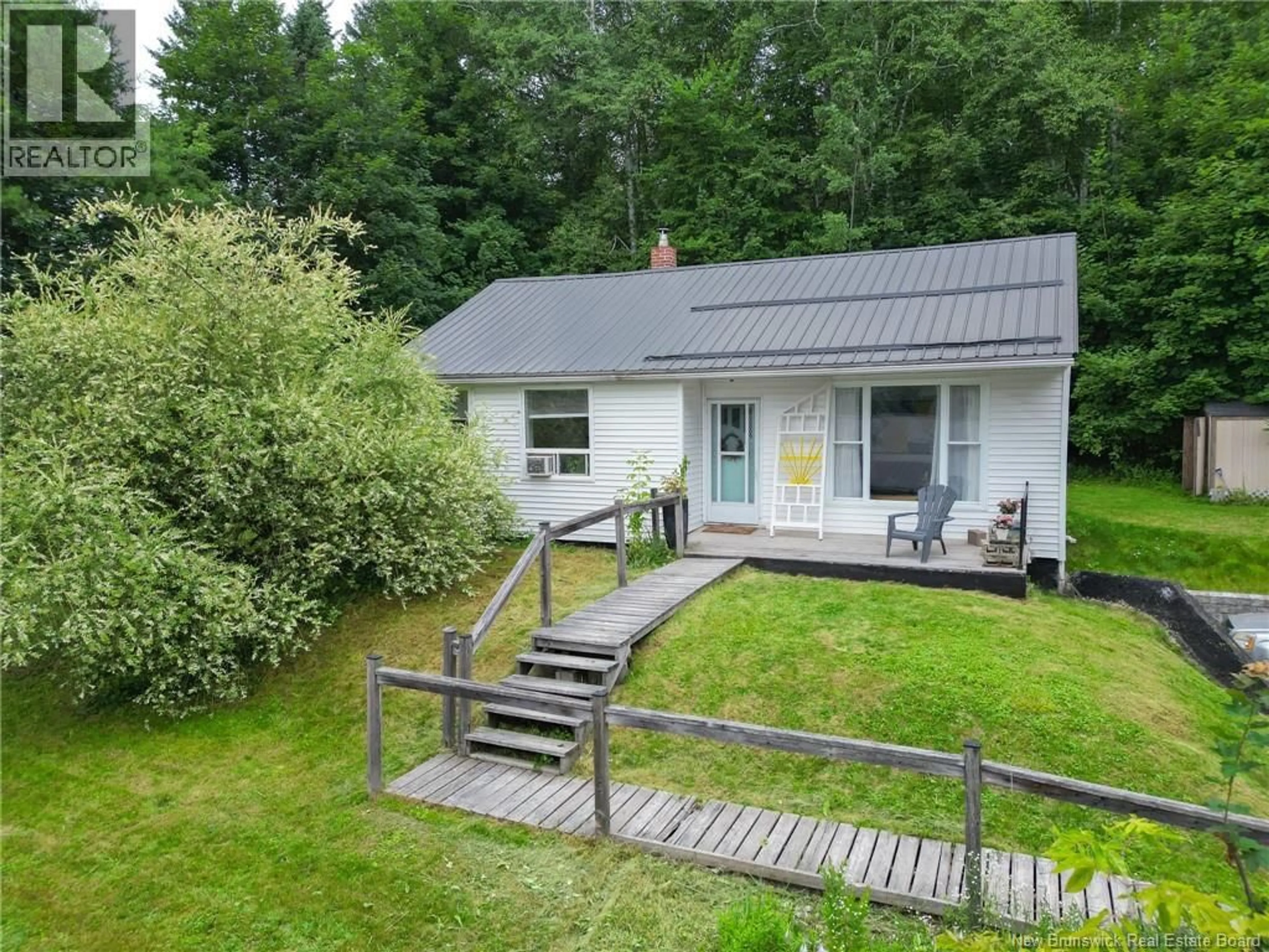 A pic from outside/outdoor area/front of a property/back of a property/a pic from drone, unknown for 107 SHARKEY STREET, Woodstock New Brunswick E7M2R1
