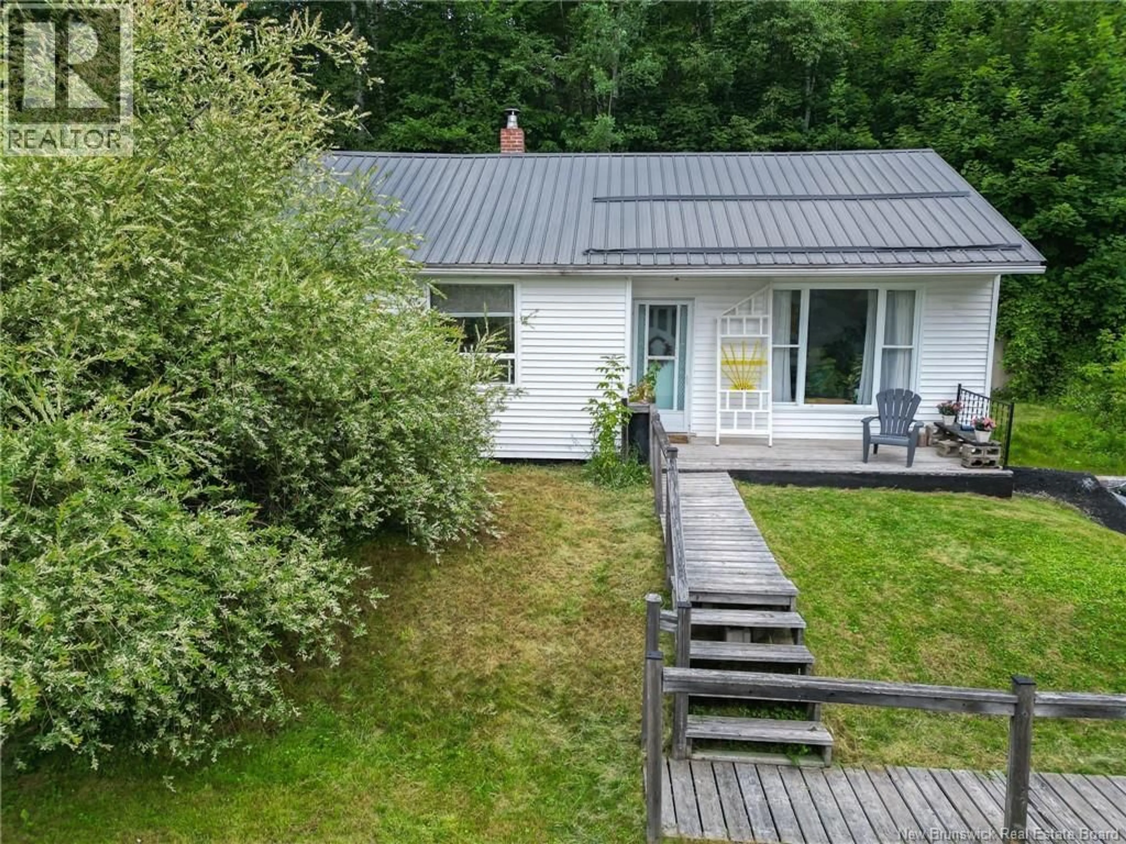A pic from outside/outdoor area/front of a property/back of a property/a pic from drone, unknown for 107 SHARKEY STREET, Woodstock New Brunswick E7M2R1