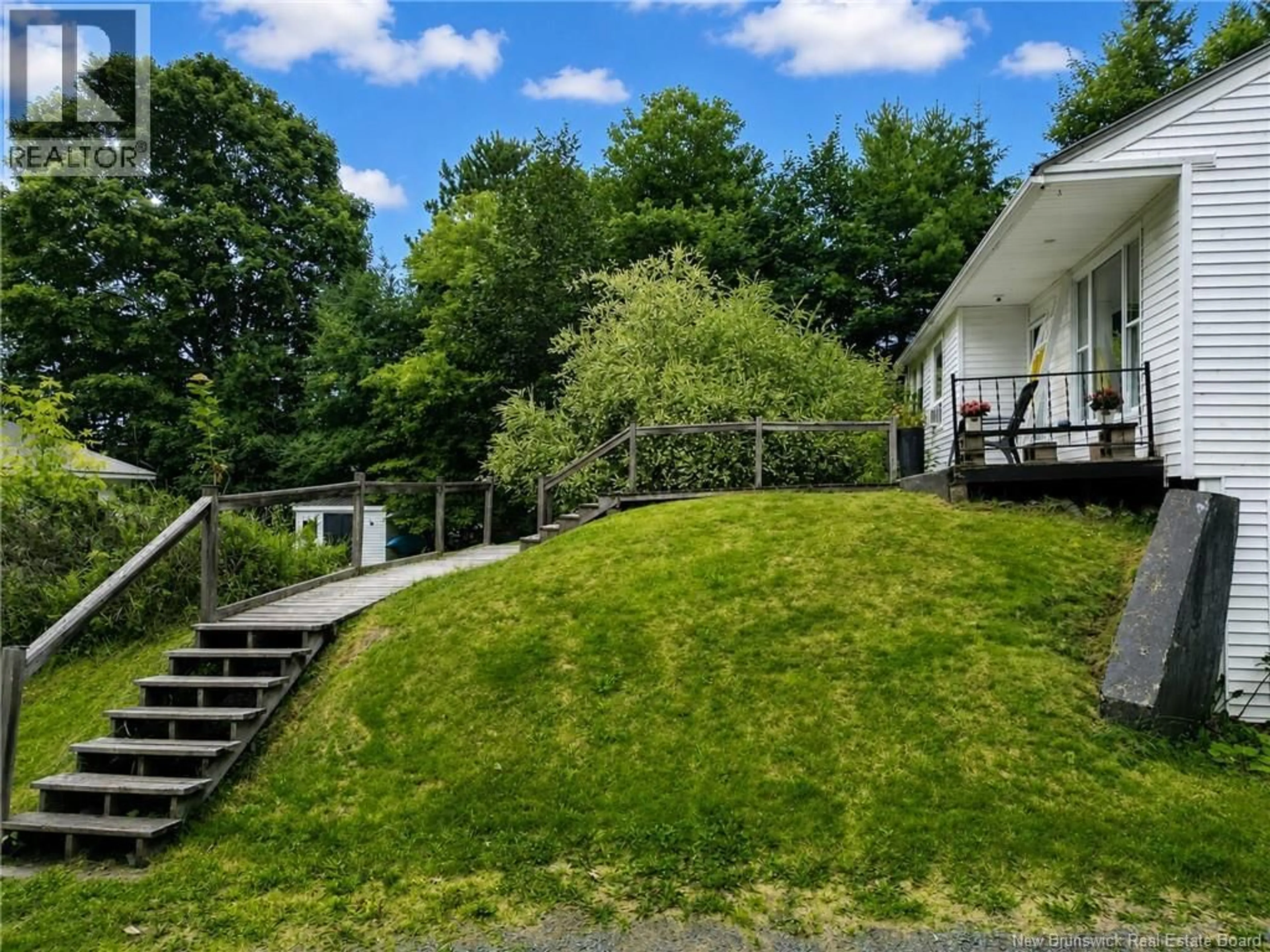A pic from outside/outdoor area/front of a property/back of a property/a pic from drone, mountain view for 107 SHARKEY STREET, Woodstock New Brunswick E7M2R1