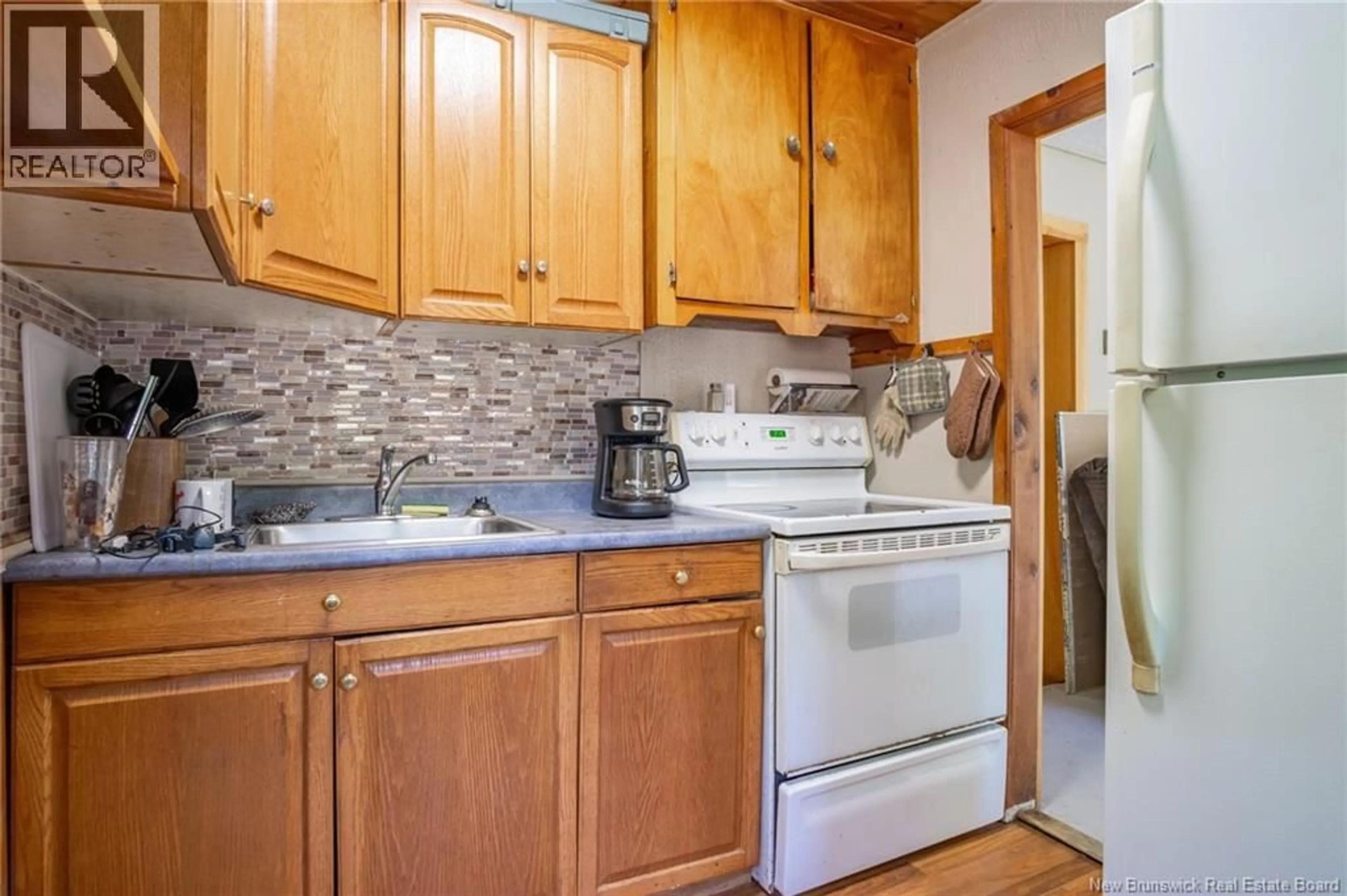 Standard kitchen, unknown for 71 SCHOONER COVE ROAD, Wilsons Beach New Brunswick E5E1N2