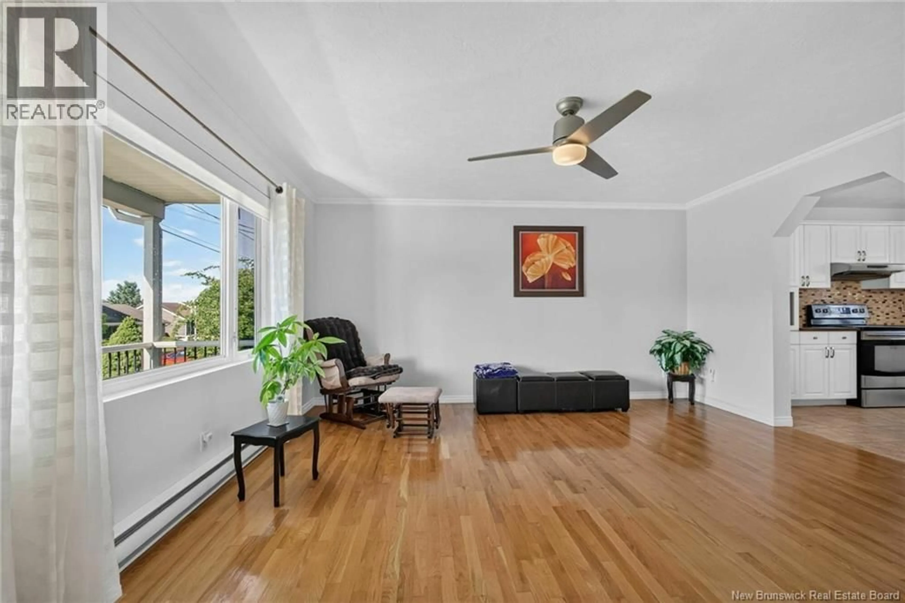 Living room with furniture, wood/laminate floor for 409 GASPÉ, Dieppe New Brunswick E1A6V8