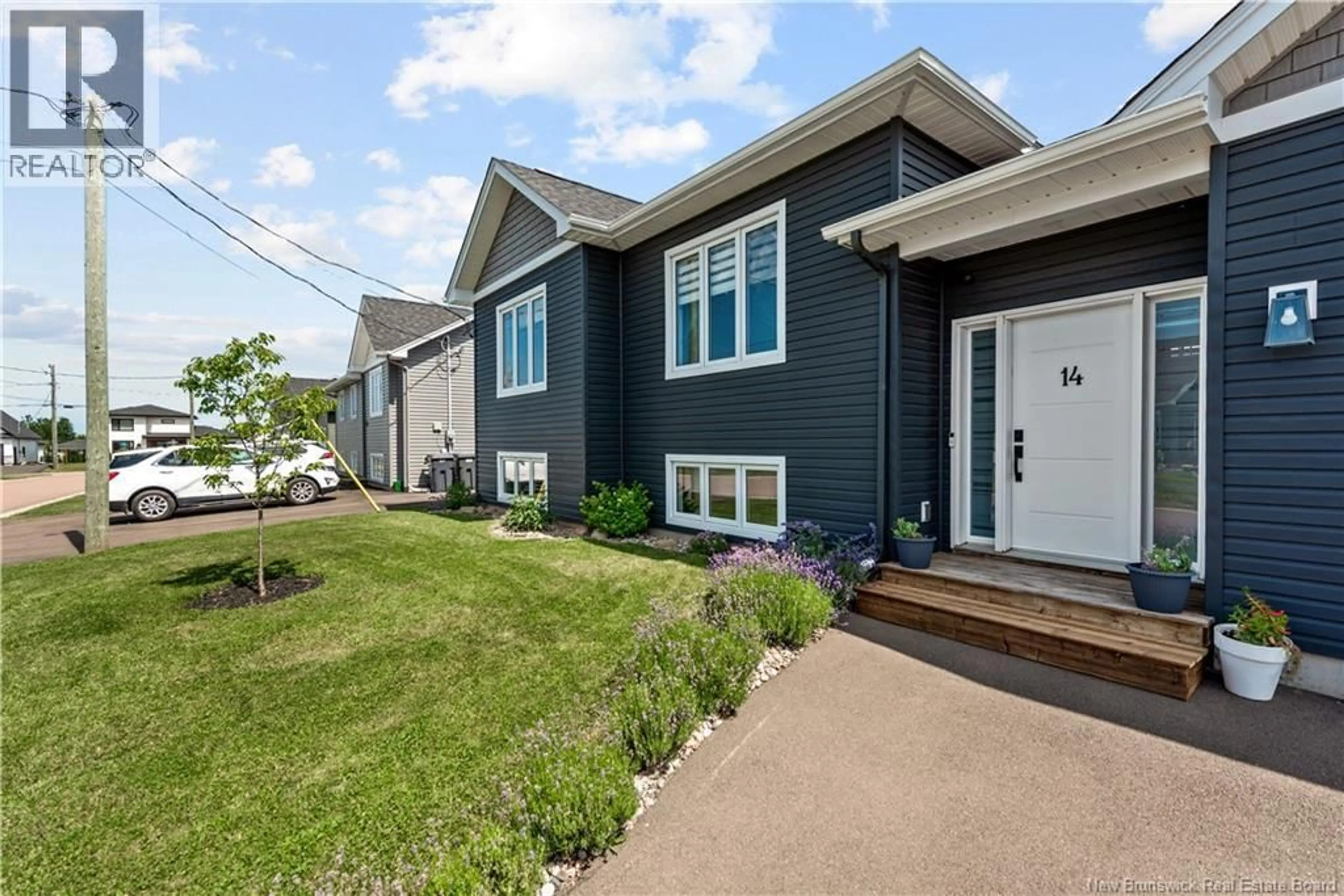 Home with vinyl exterior material, street for 14 ROBERT STREET, Shediac New Brunswick E4P0R2