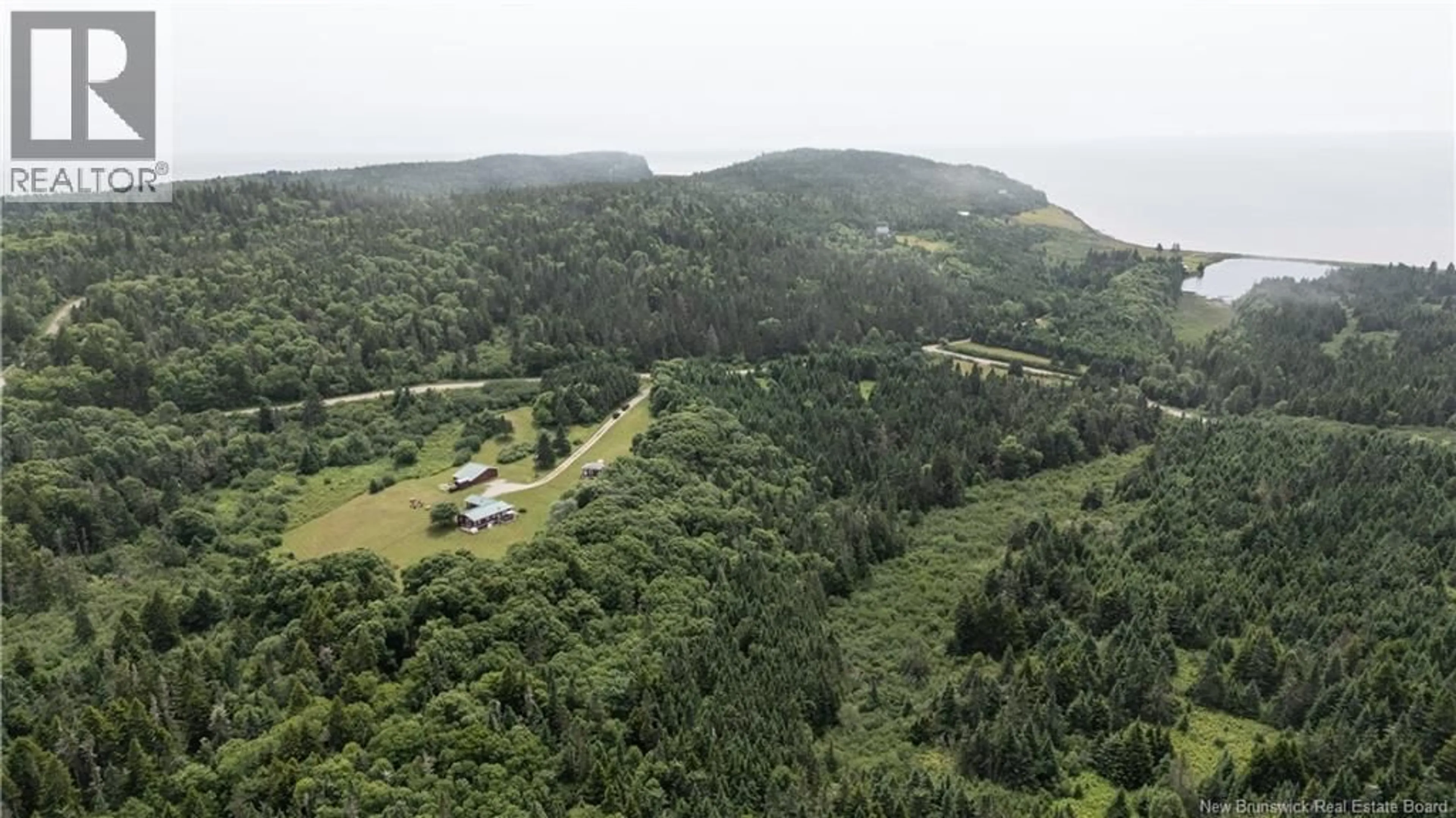 A pic from outside/outdoor area/front of a property/back of a property/a pic from drone, forest/trees view for 279 CAPE ENRAGE ROAD, Waterside New Brunswick E4H4L2