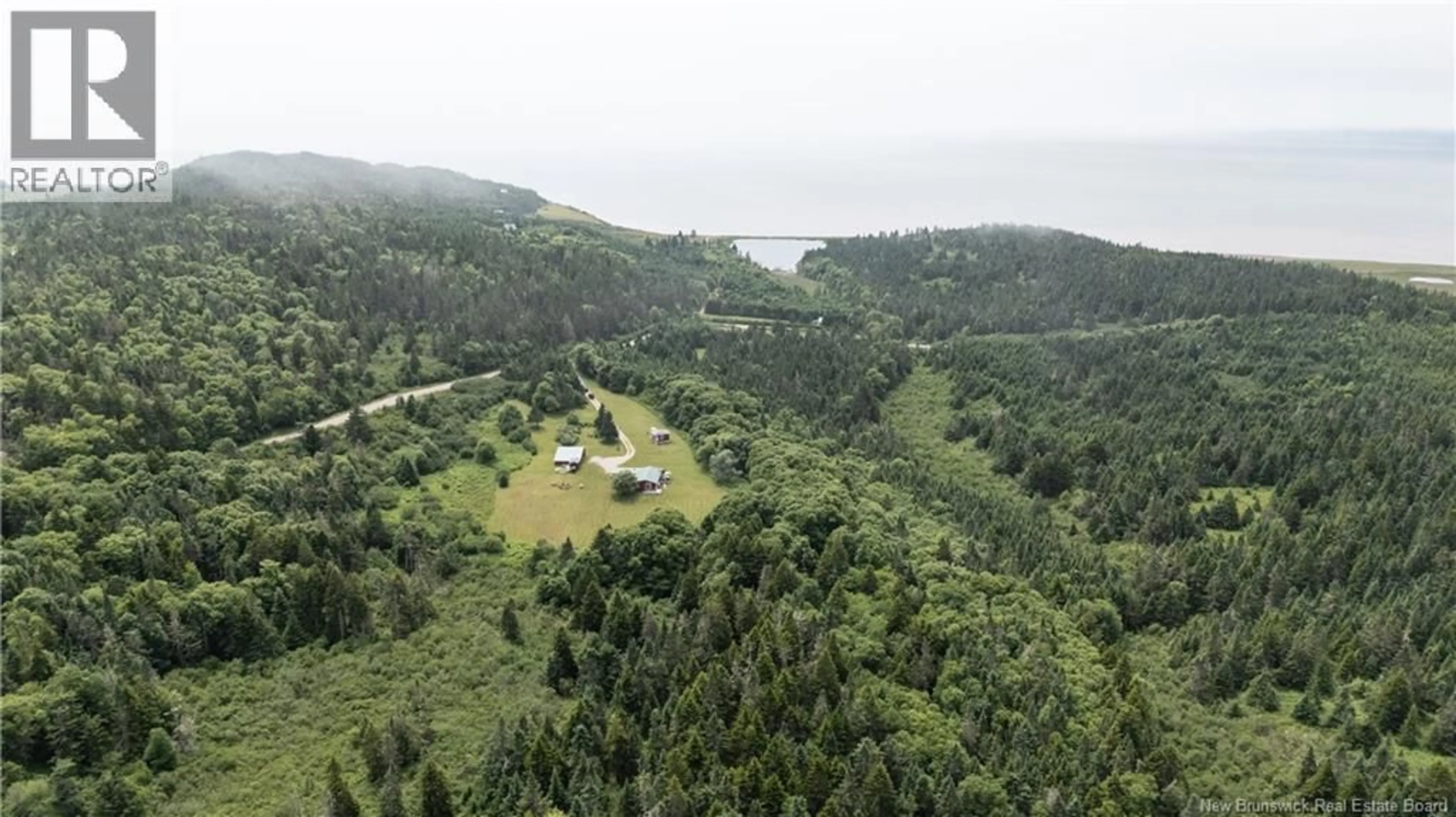 A pic from outside/outdoor area/front of a property/back of a property/a pic from drone, forest/trees view for 279 CAPE ENRAGE ROAD, Waterside New Brunswick E4H4L2