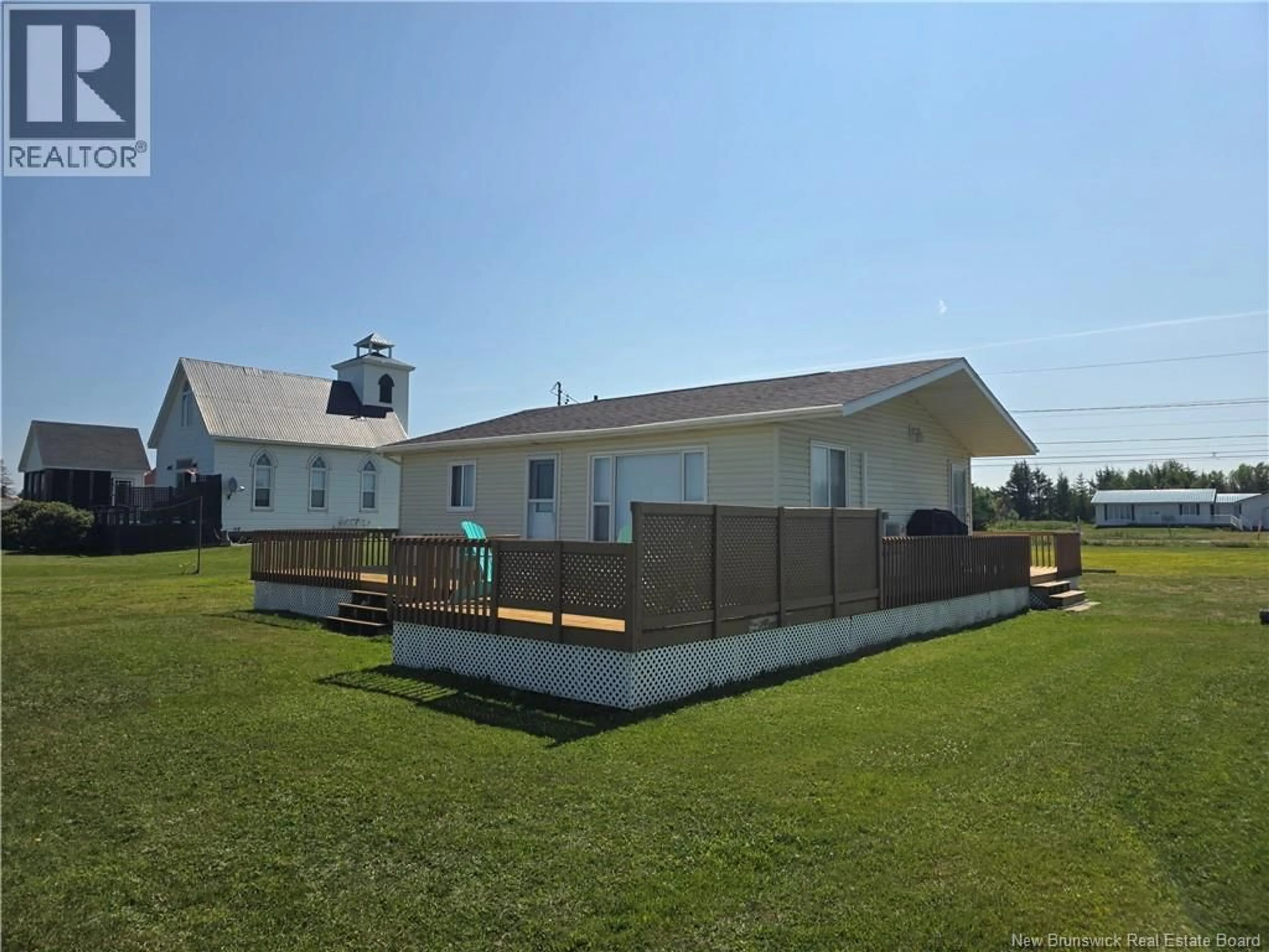 A pic from outside/outdoor area/front of a property/back of a property/a pic from drone, unknown for 5941 RTE 11, Janeville New Brunswick E2A5L1