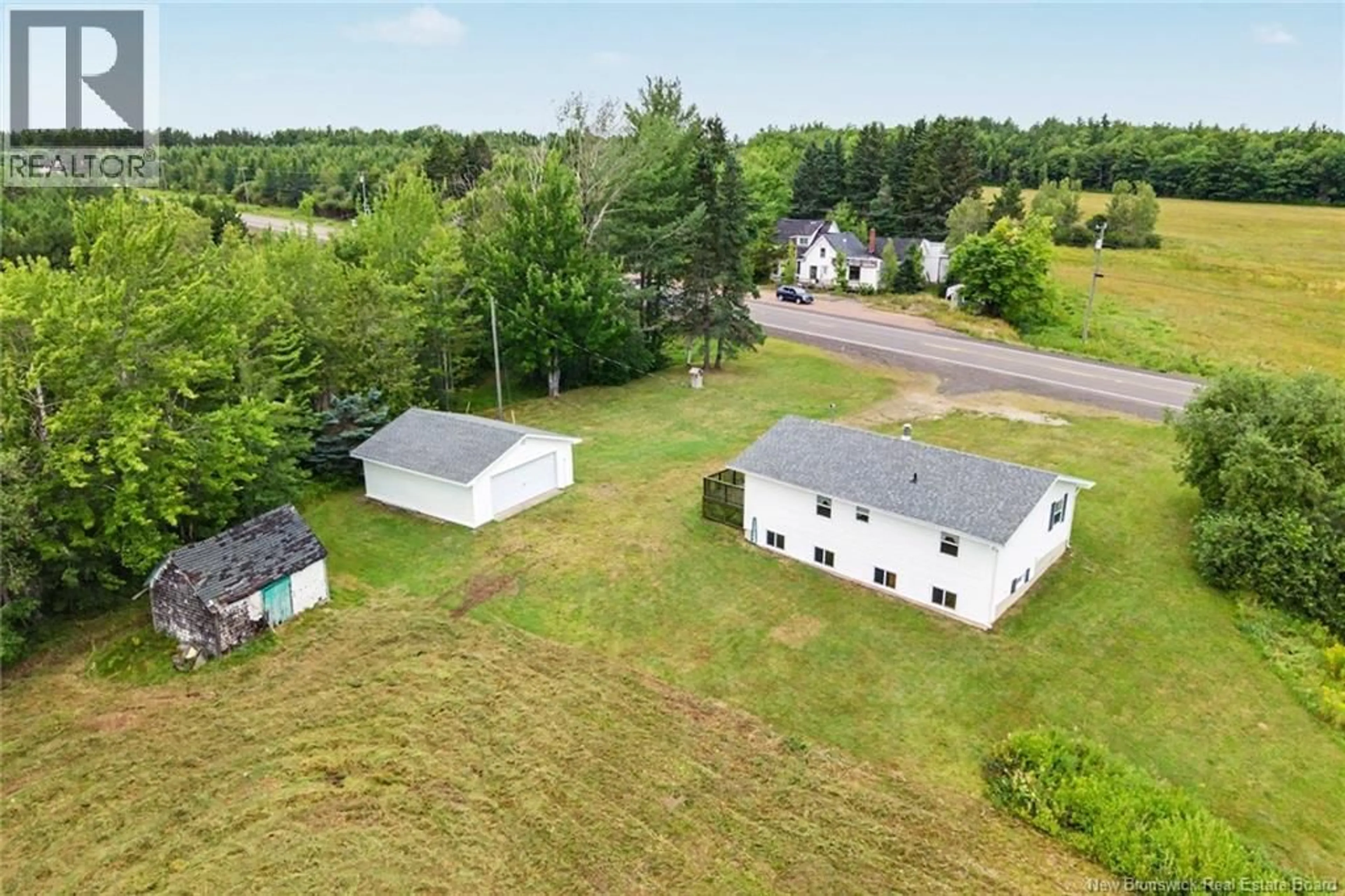 A pic from outside/outdoor area/front of a property/back of a property/a pic from drone, building for 10852 ROUTE 10, Youngs Cove New Brunswick E4C2G1