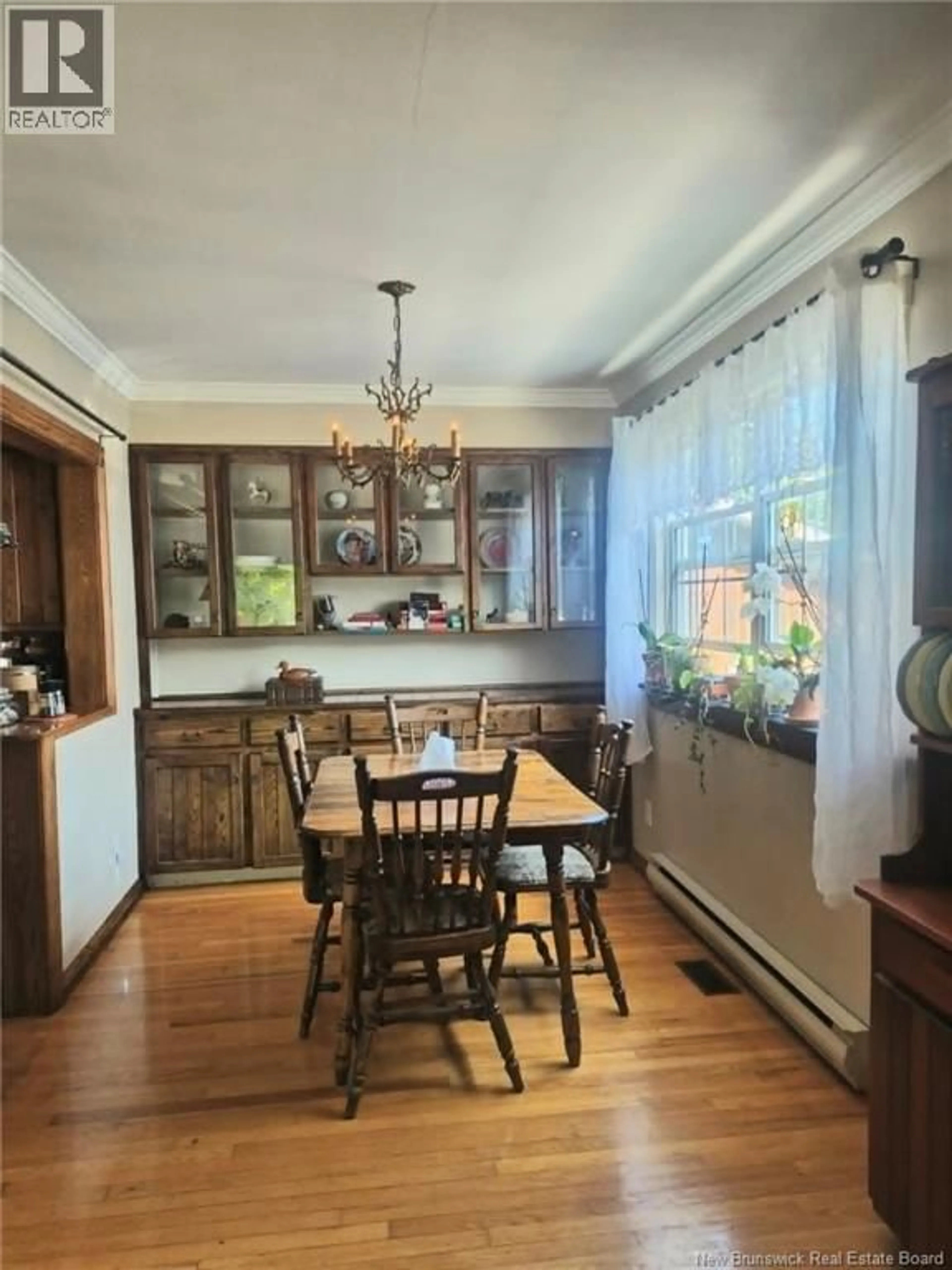 Dining room, wood/laminate floor for 61 CARNEY AVENUE, Moncton New Brunswick E1C4H6