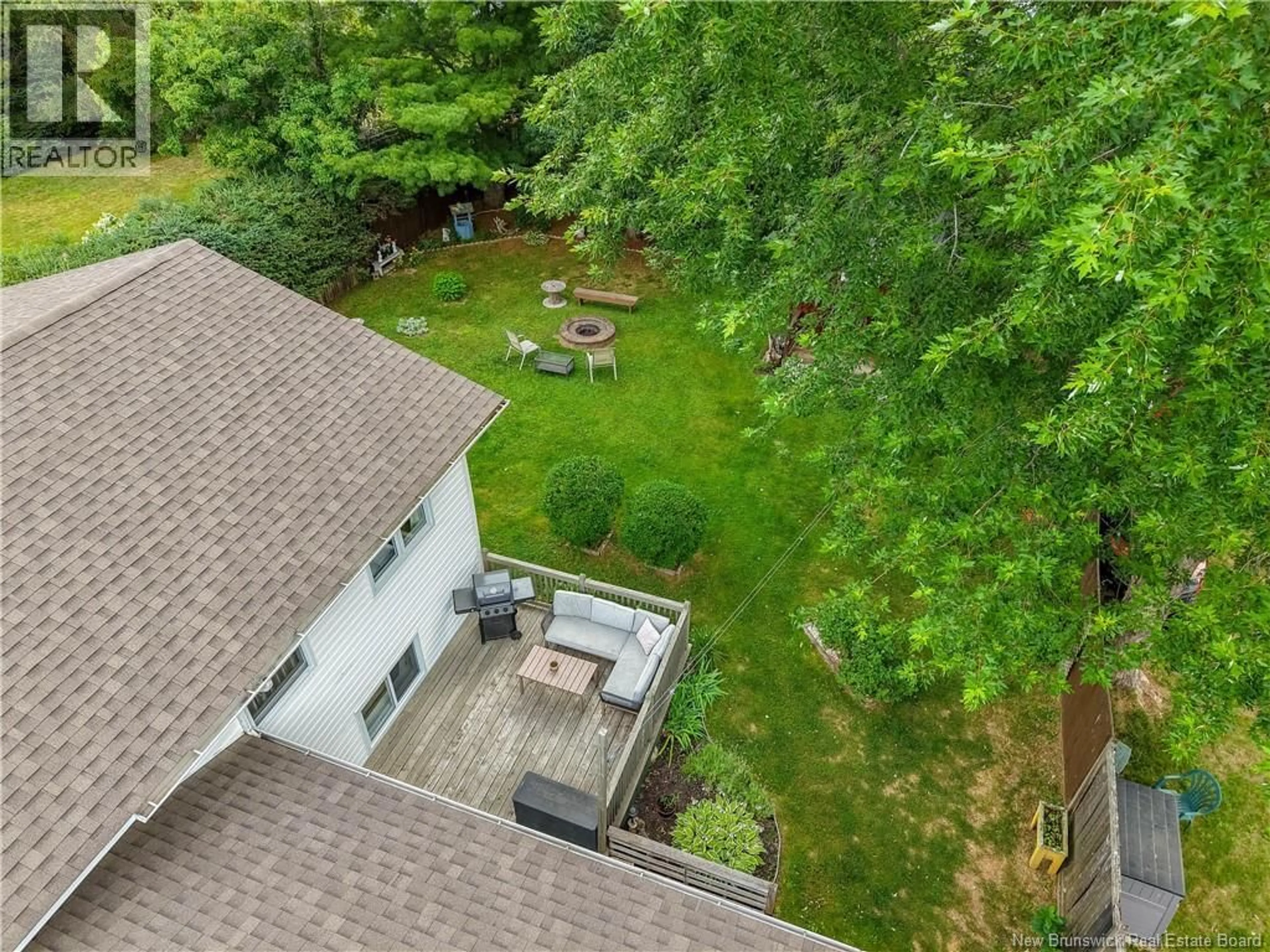 A pic from outside/outdoor area/front of a property/back of a property/a pic from drone, forest/trees view for 52 DRAMMEN DRIVE, Fredericton New Brunswick E3A5S2