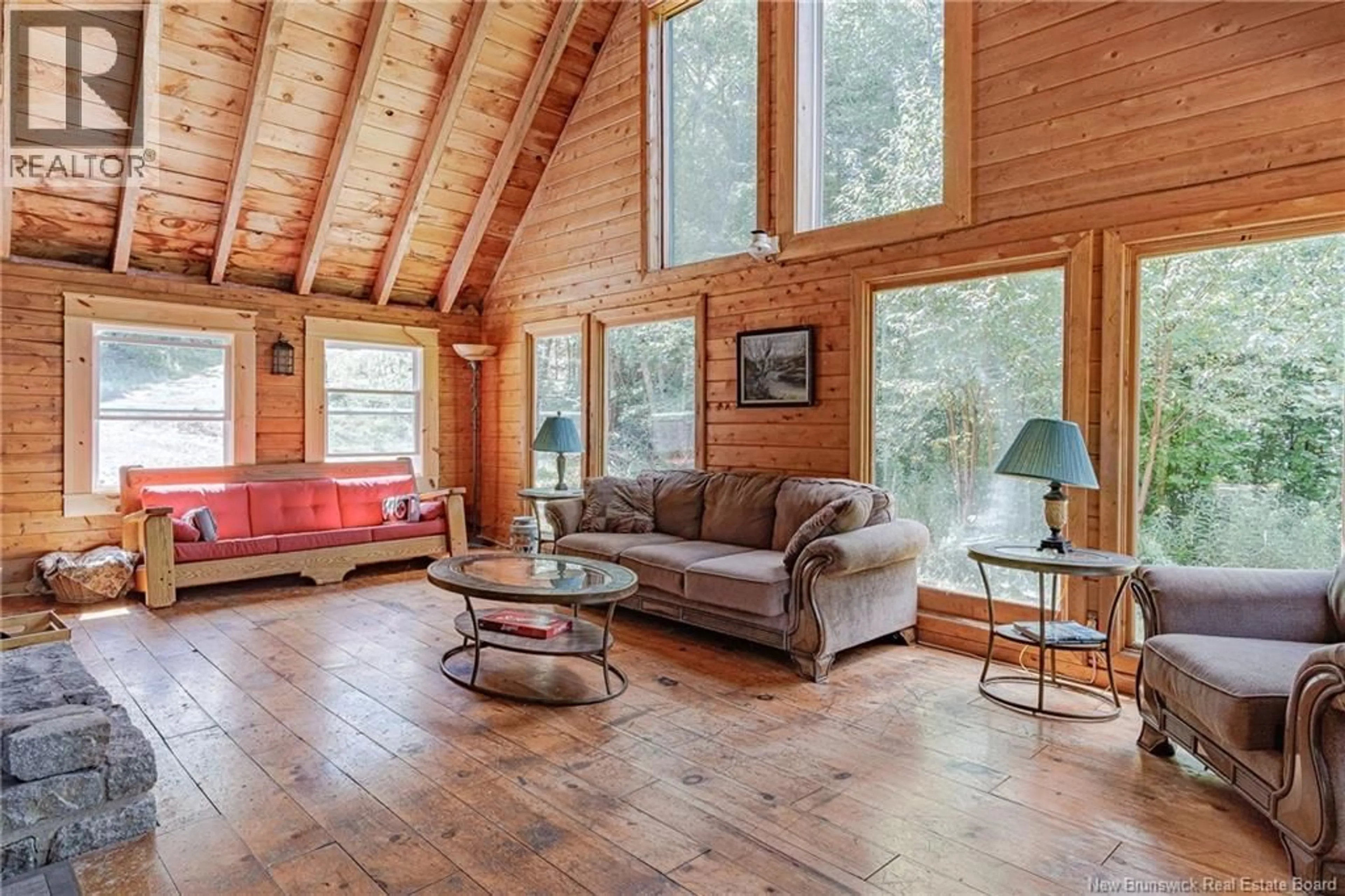 Living room with furniture, wood/laminate floor for 165 BACK RIVER ROAD, Barnesville New Brunswick E5N4R8