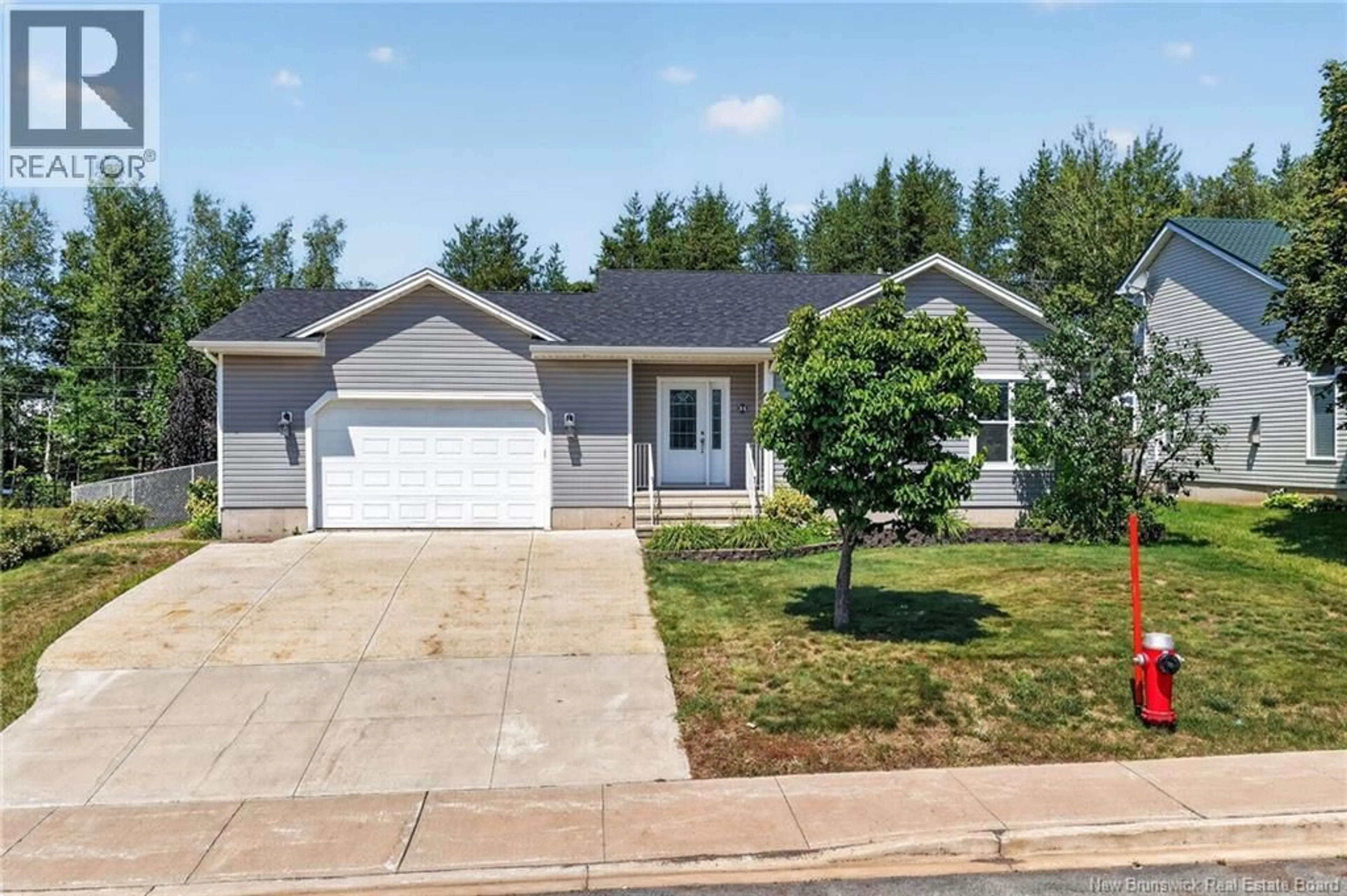 Home with vinyl exterior material, street for 31 XAVIER AVENUE, Moncton New Brunswick E1A6J8