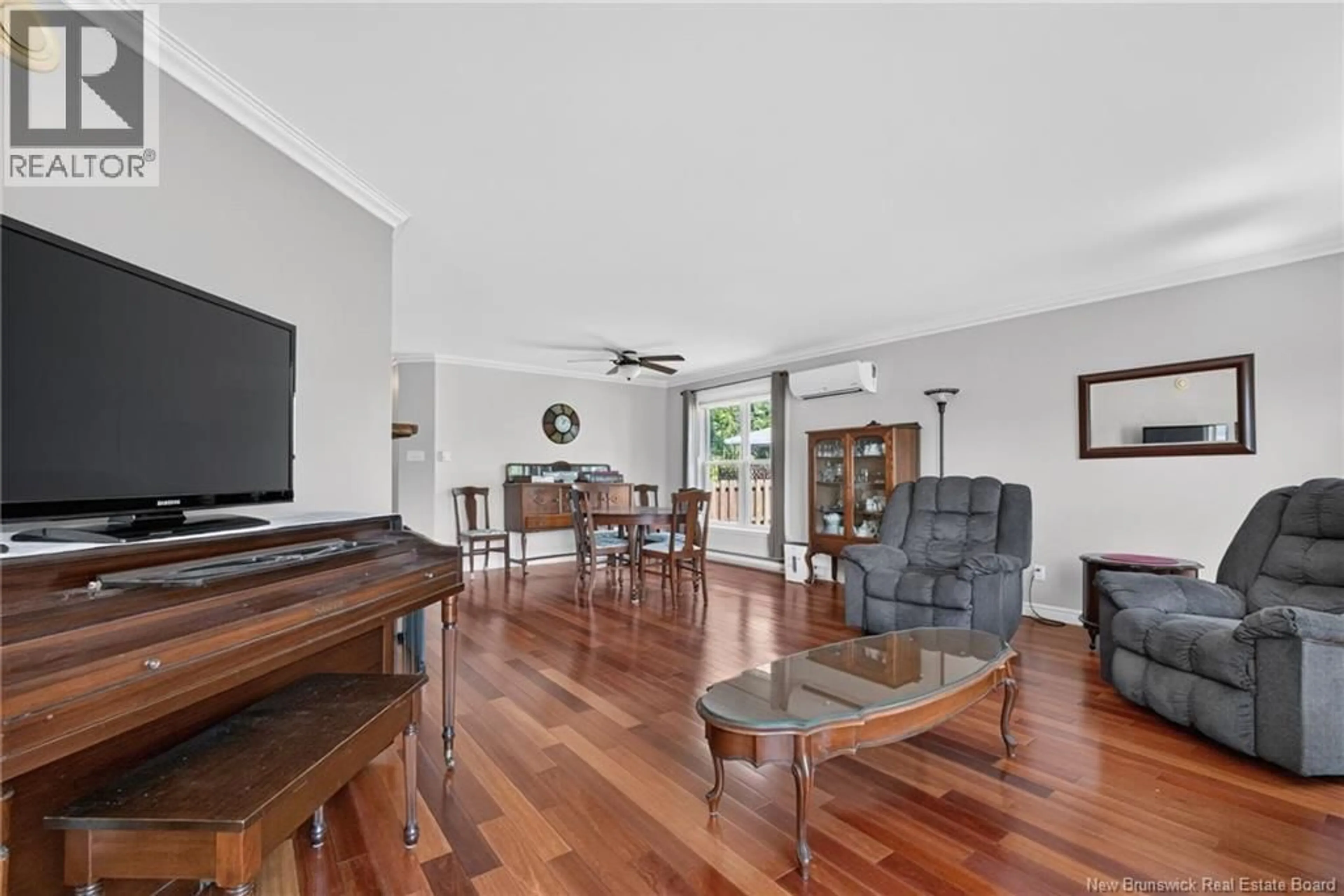 Living room with furniture, unknown for 31 XAVIER AVENUE, Moncton New Brunswick E1A6J8