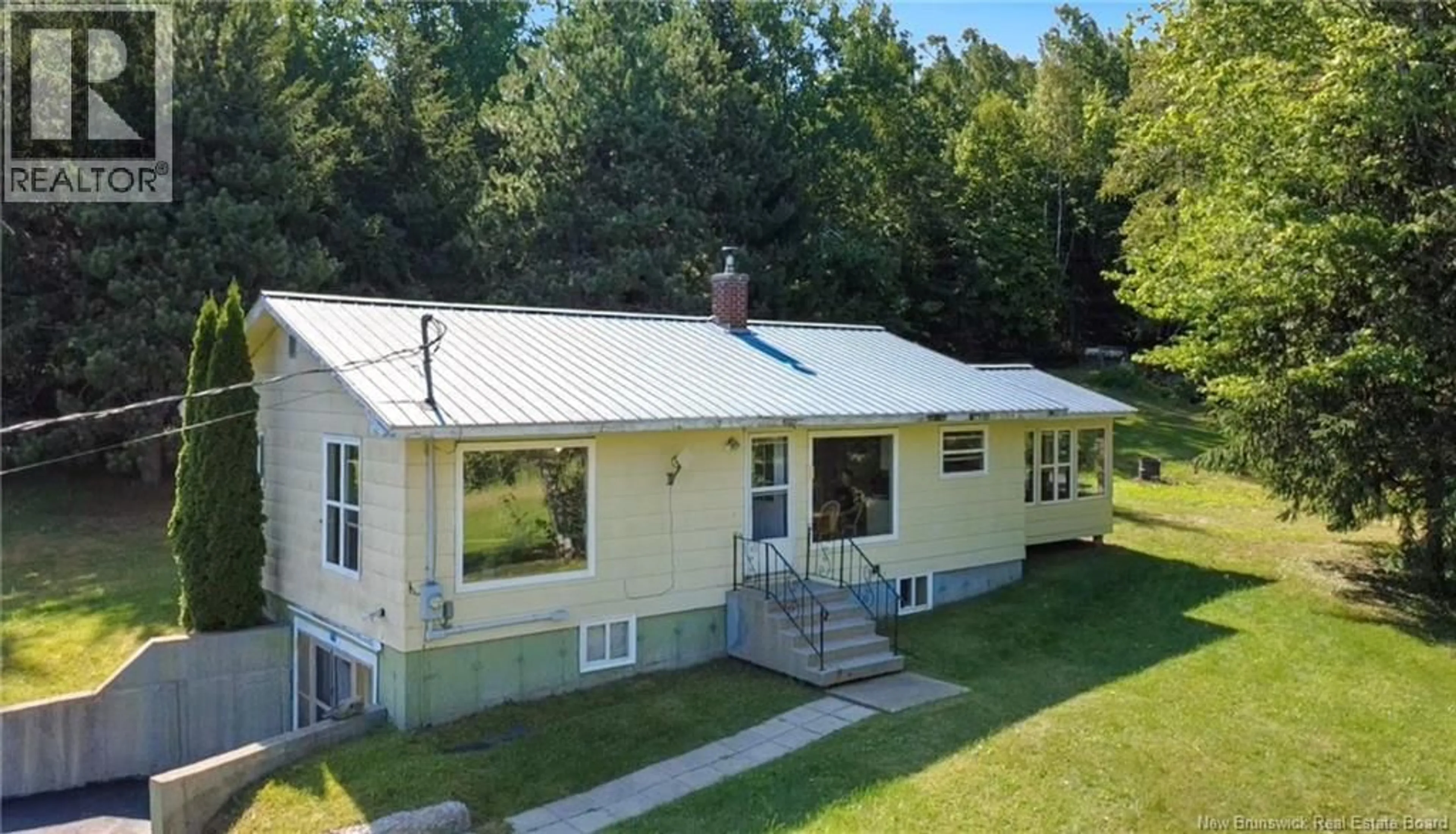A pic from outside/outdoor area/front of a property/back of a property/a pic from drone, building for 79 DAVIDSON ROAD, Anagance New Brunswick E4Z1C6
