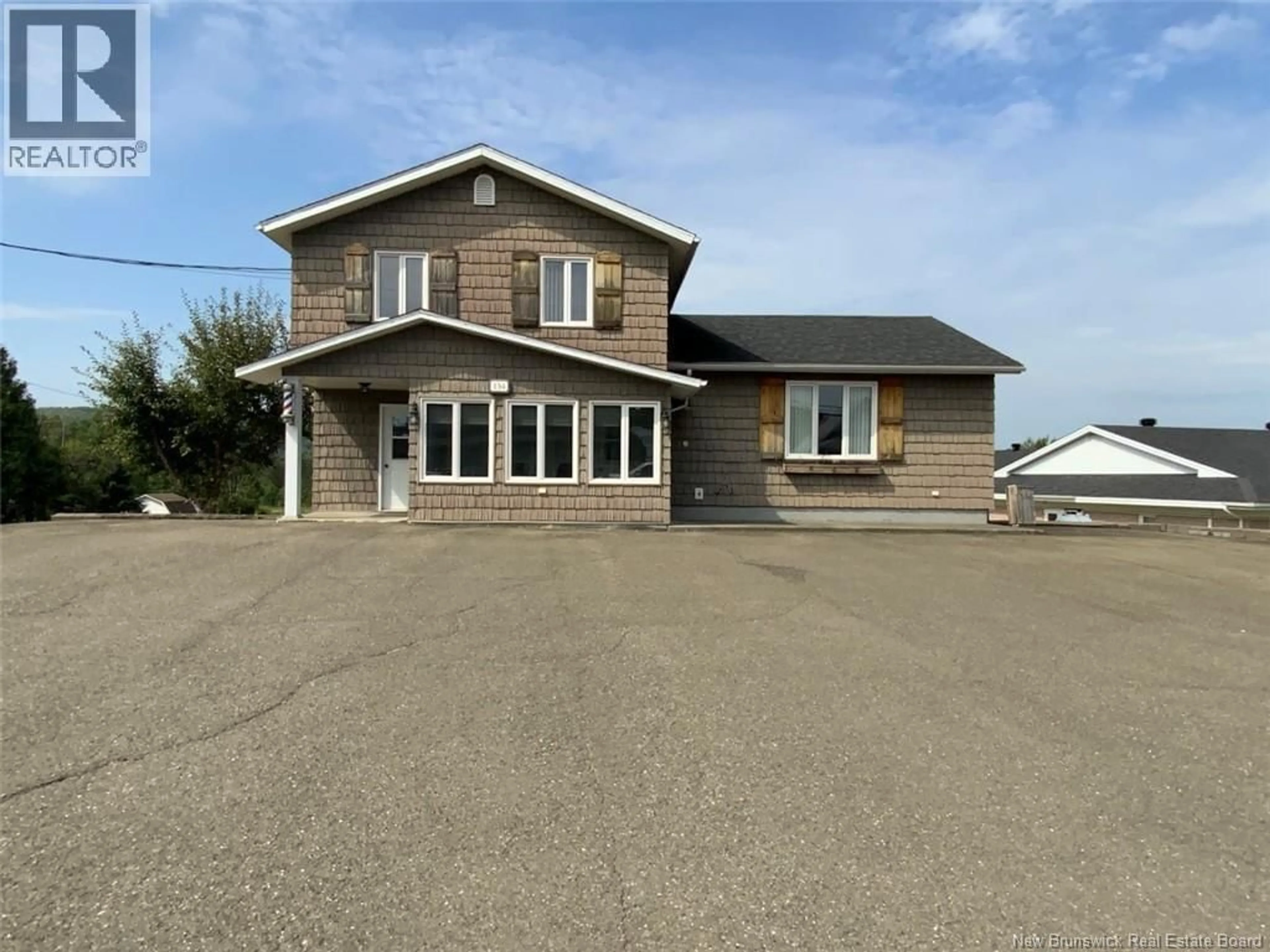 A pic from outside/outdoor area/front of a property/back of a property/a pic from drone, building for 134 PRINCIPALE STREET, Sainte-Anne-De-Madawaska New Brunswick E7E0C4