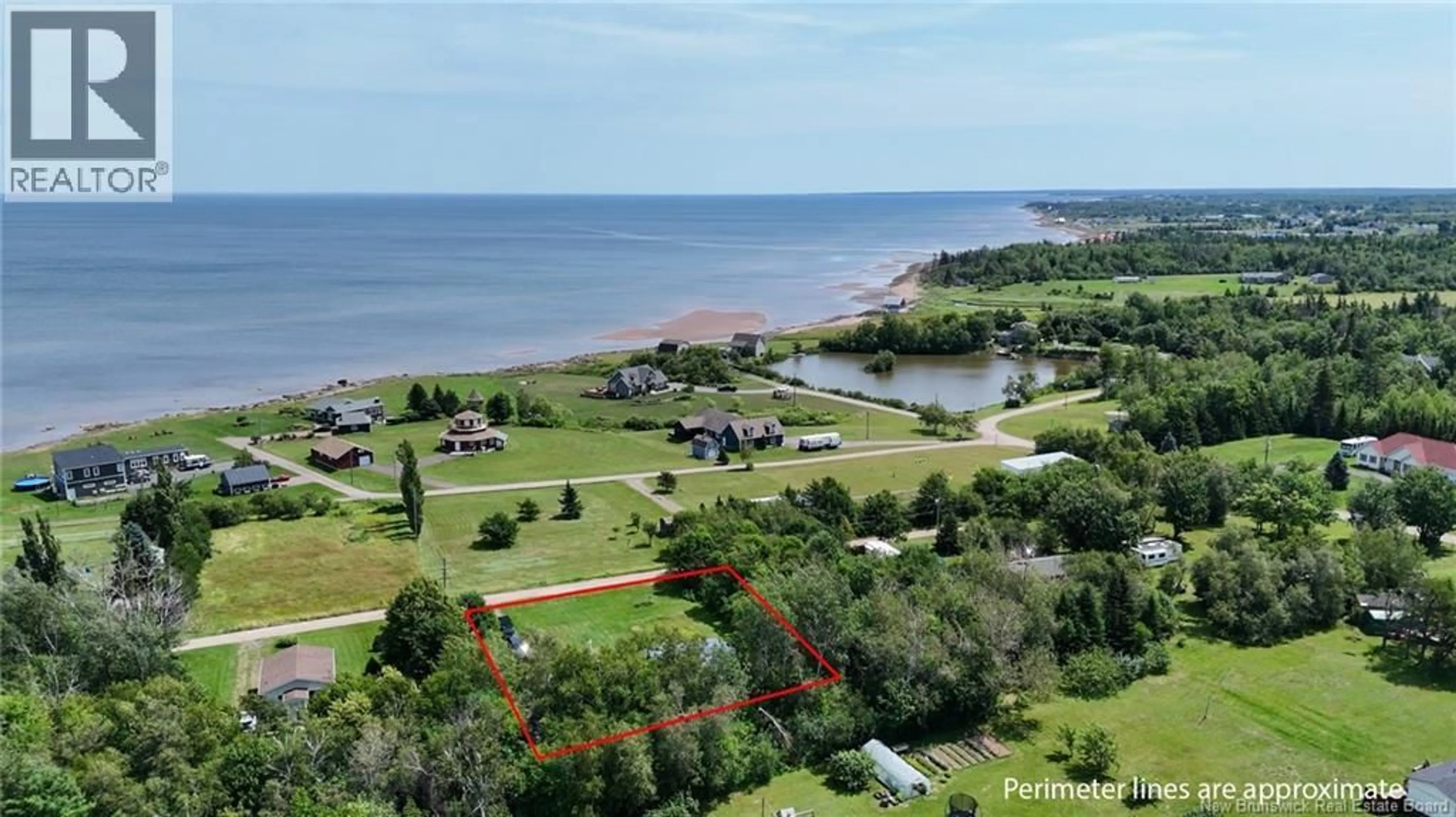 A pic from outside/outdoor area/front of a property/back of a property/a pic from drone, water/lake/river/ocean view for 41 ALLEE BORGITTE, Beaubassin East New Brunswick E4N1A3