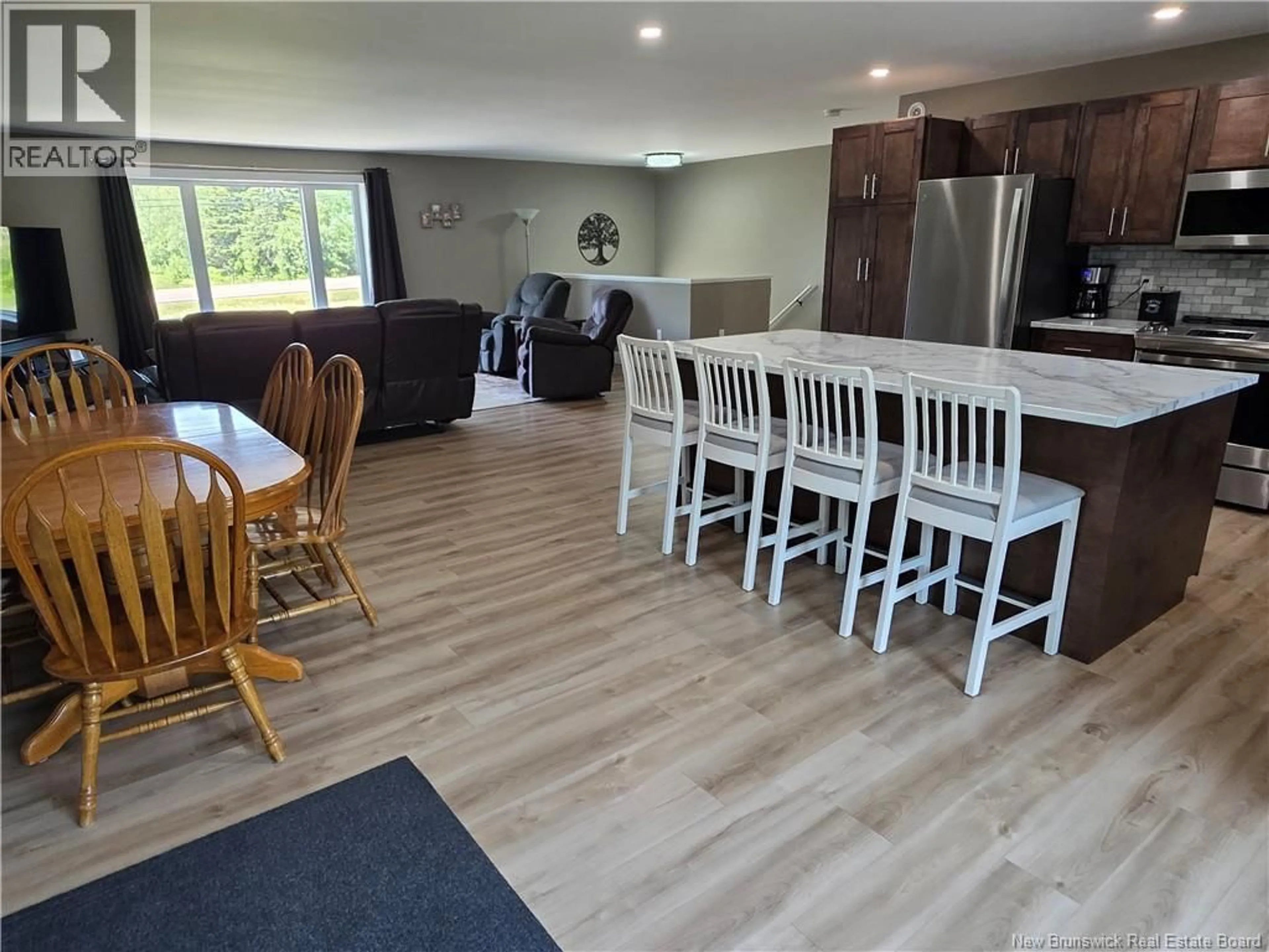 Open concept kitchen, wood/laminate floor for 4419 RTE 115, Saint-Antoine New Brunswick E4V2Z5