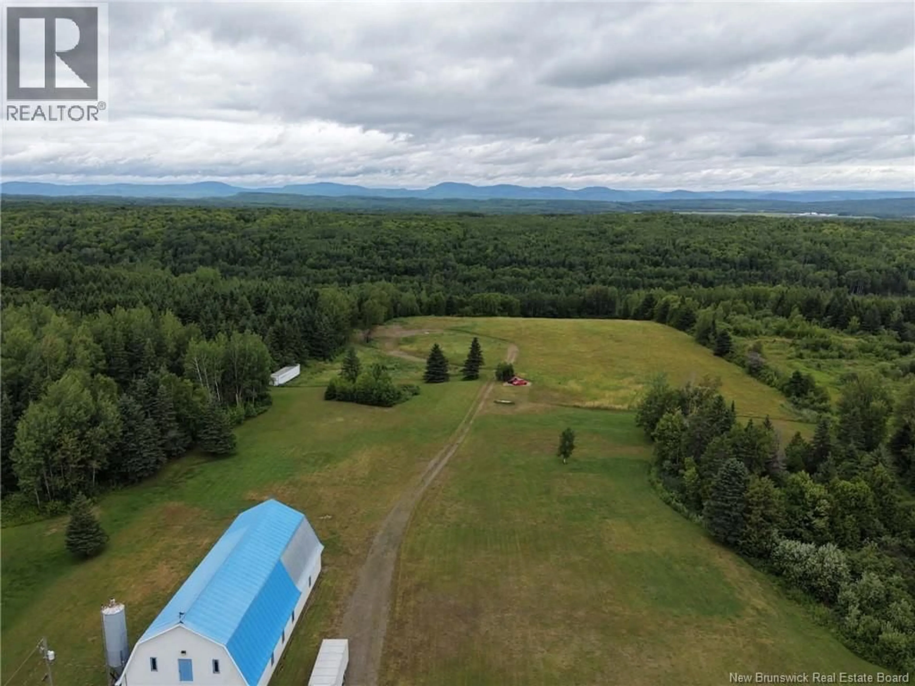 A pic from outside/outdoor area/front of a property/back of a property/a pic from drone, mountain view for 1359 DES PIONNIERS AVENUE, Balmoral New Brunswick E8E1B7