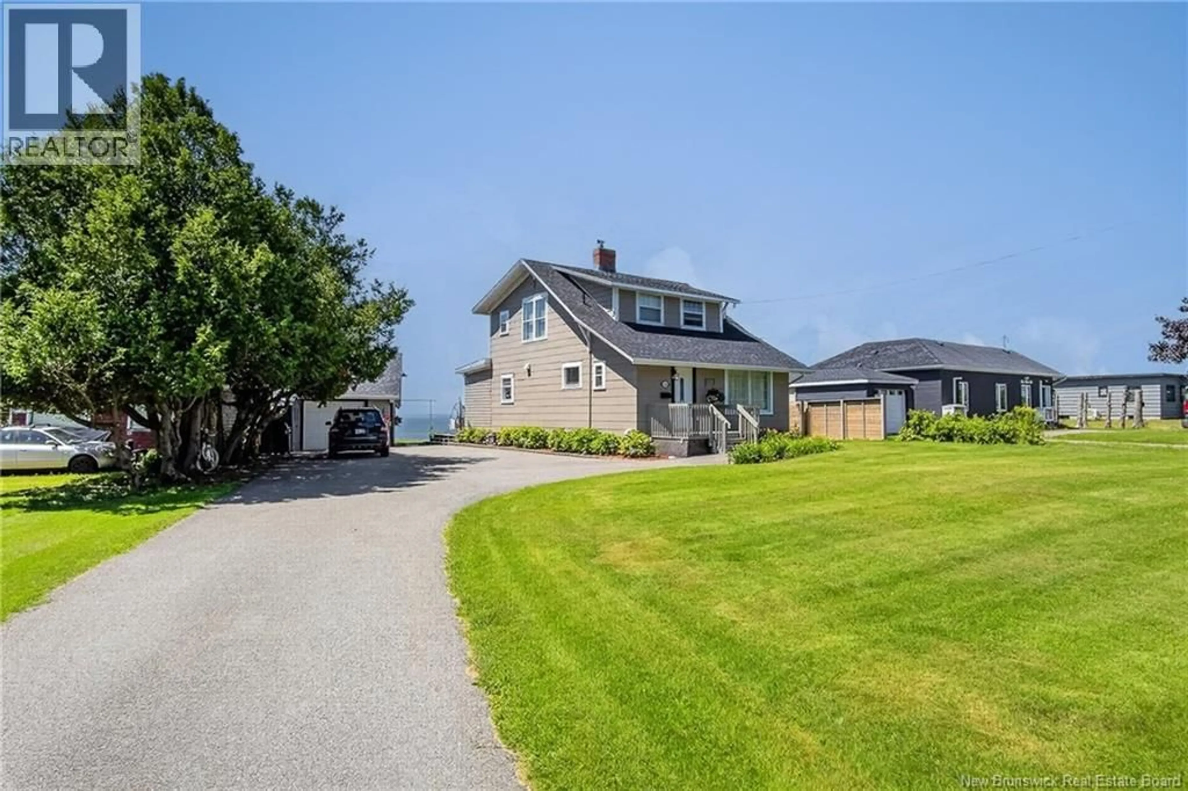 A pic from outside/outdoor area/front of a property/back of a property/a pic from drone, water/lake/river/ocean view for 1240 RED HEAD ROAD, Saint John New Brunswick E2P1K3
