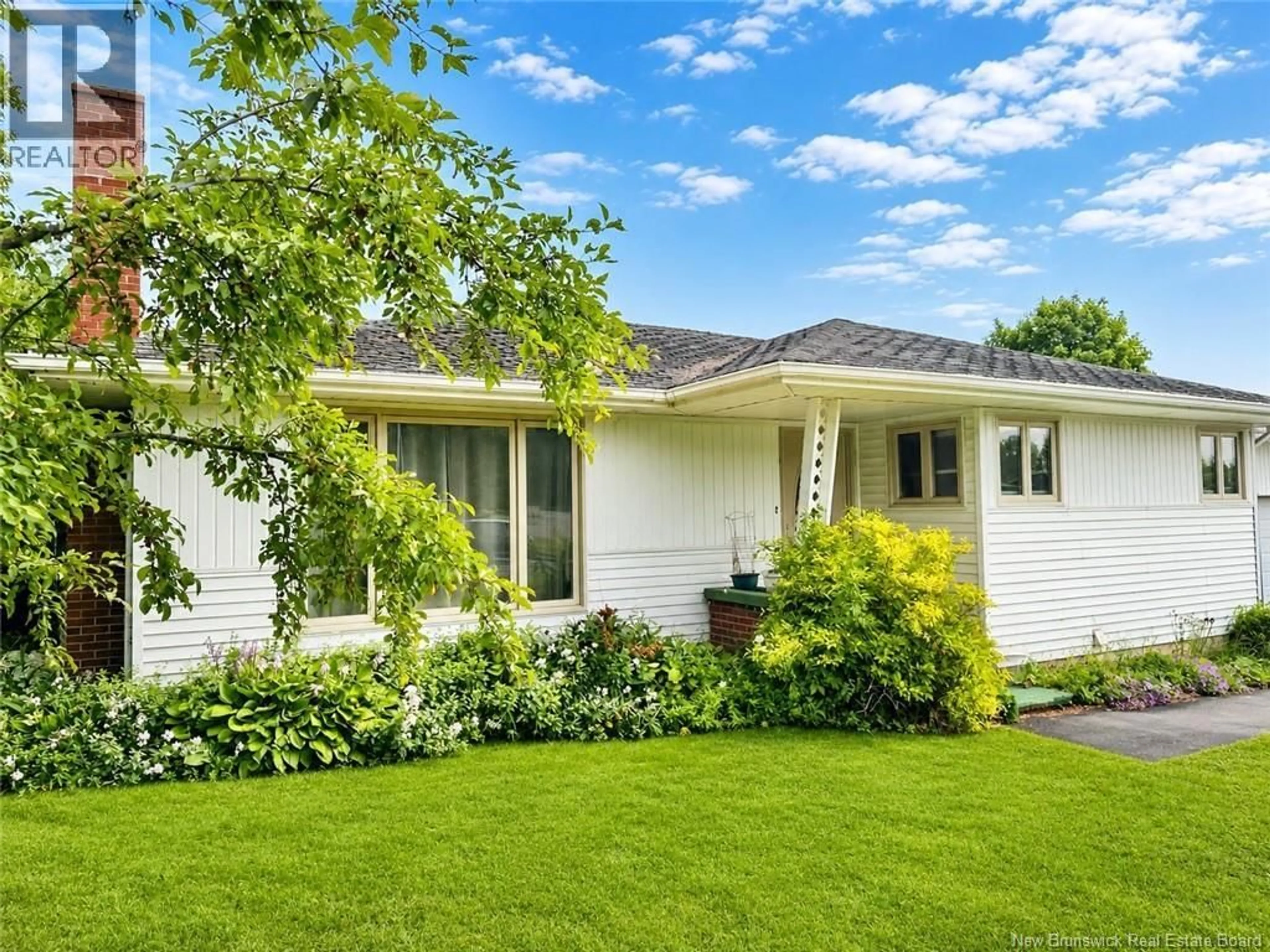 Home with vinyl exterior material, street for 688 EH DAIGLE BOULEVARD, Grand-Sault/Grand Falls New Brunswick E3Z2S1