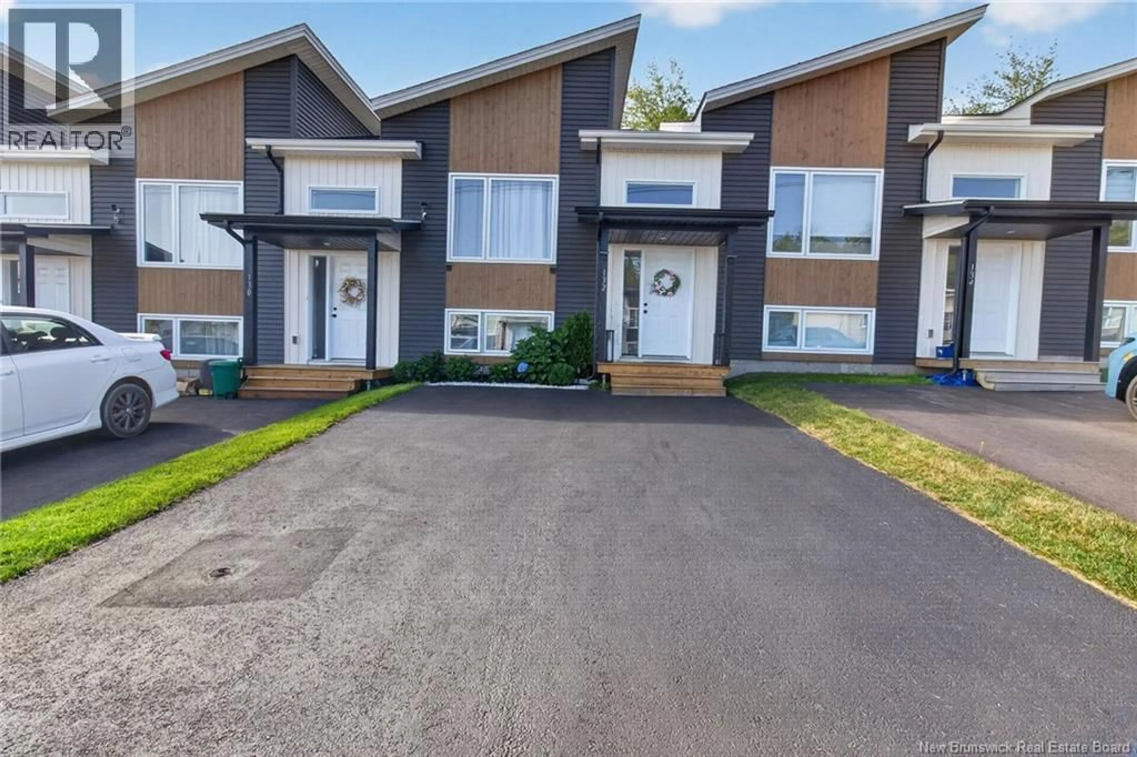 A pic from outside/outdoor area/front of a property/back of a property/a pic from drone, street for 132 DONAT CRESCENT, Dieppe New Brunswick E1A9L4