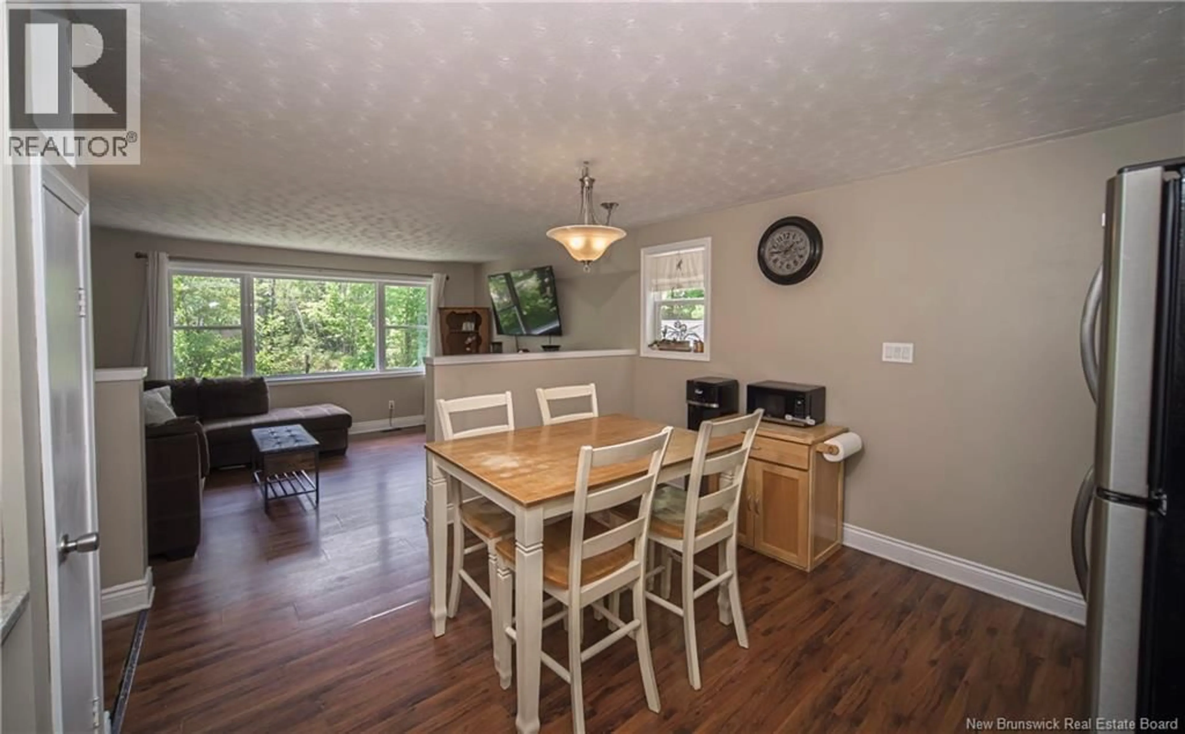 Dining room, wood/laminate floor for 51 CARR STREET, Geary New Brunswick E2V4C1
