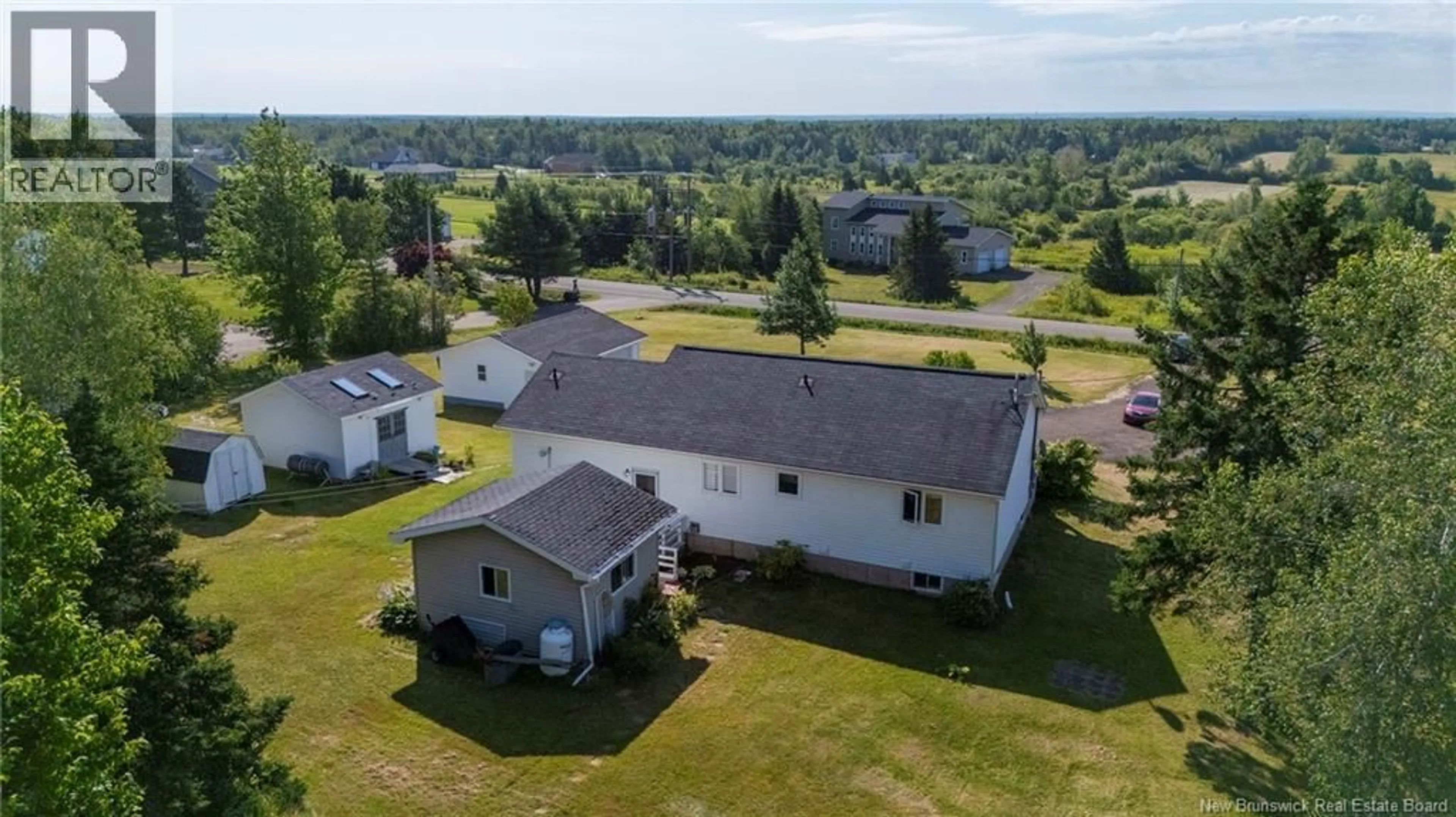 A pic from outside/outdoor area/front of a property/back of a property/a pic from drone, unknown for 529 AMMON ROAD, Ammon New Brunswick E1G3N3