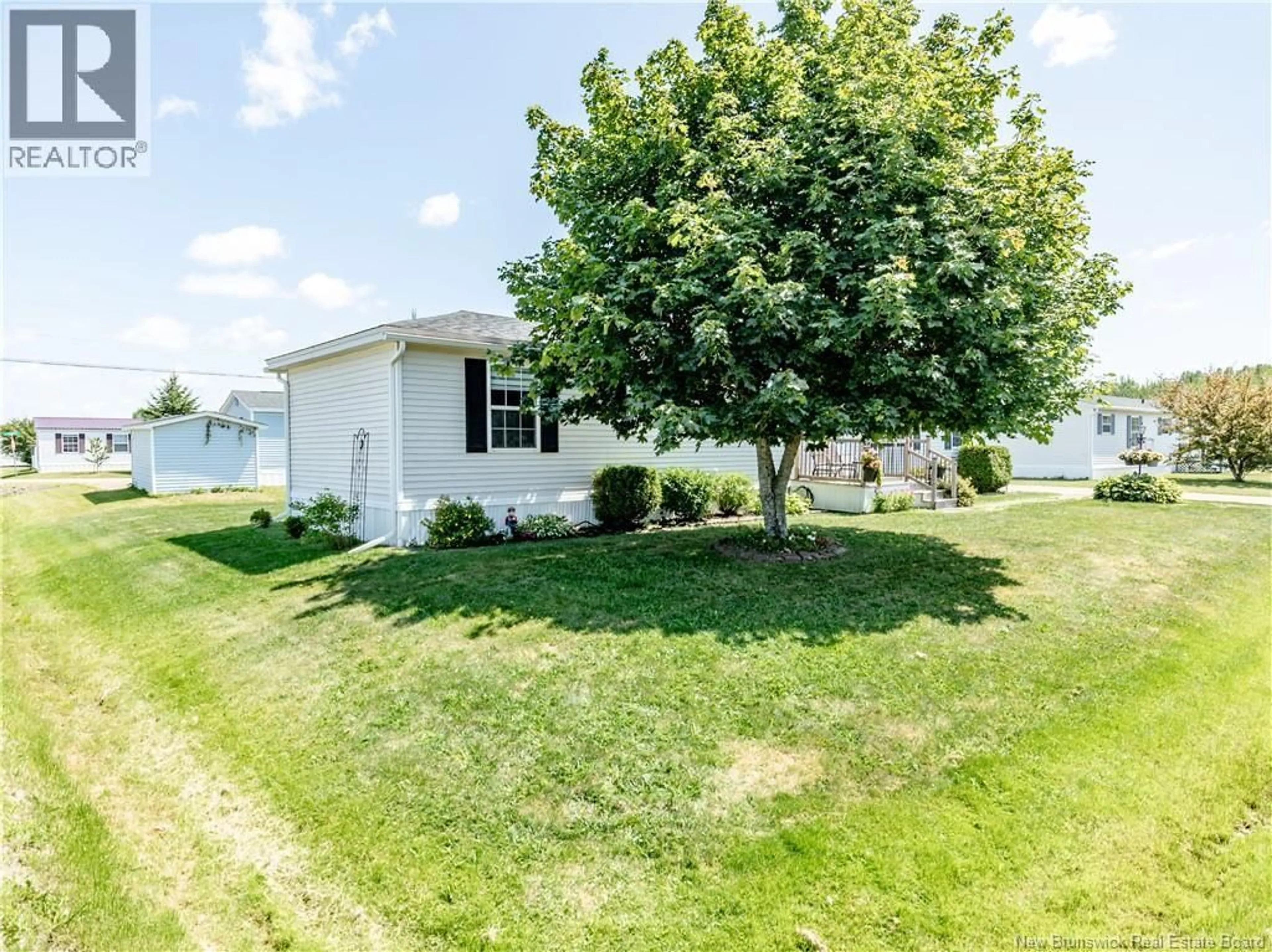 A pic from outside/outdoor area/front of a property/back of a property/a pic from drone, water/lake/river/ocean view for 2 CORINO, Moncton New Brunswick E1H2V6
