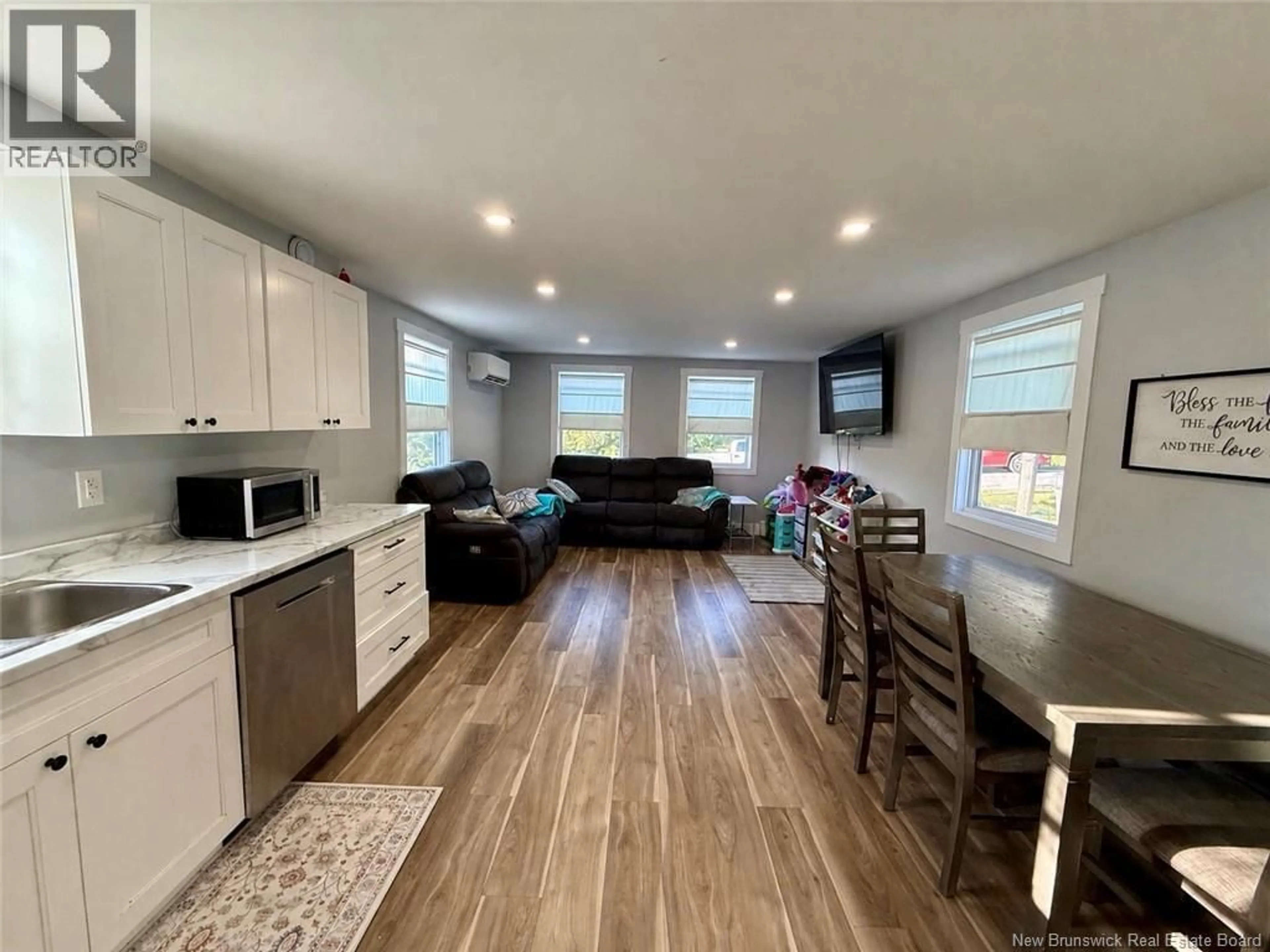 Open concept kitchen, wood/laminate floor for 182 LOGIE DRIVE, Hampton New Brunswick E5N5T5