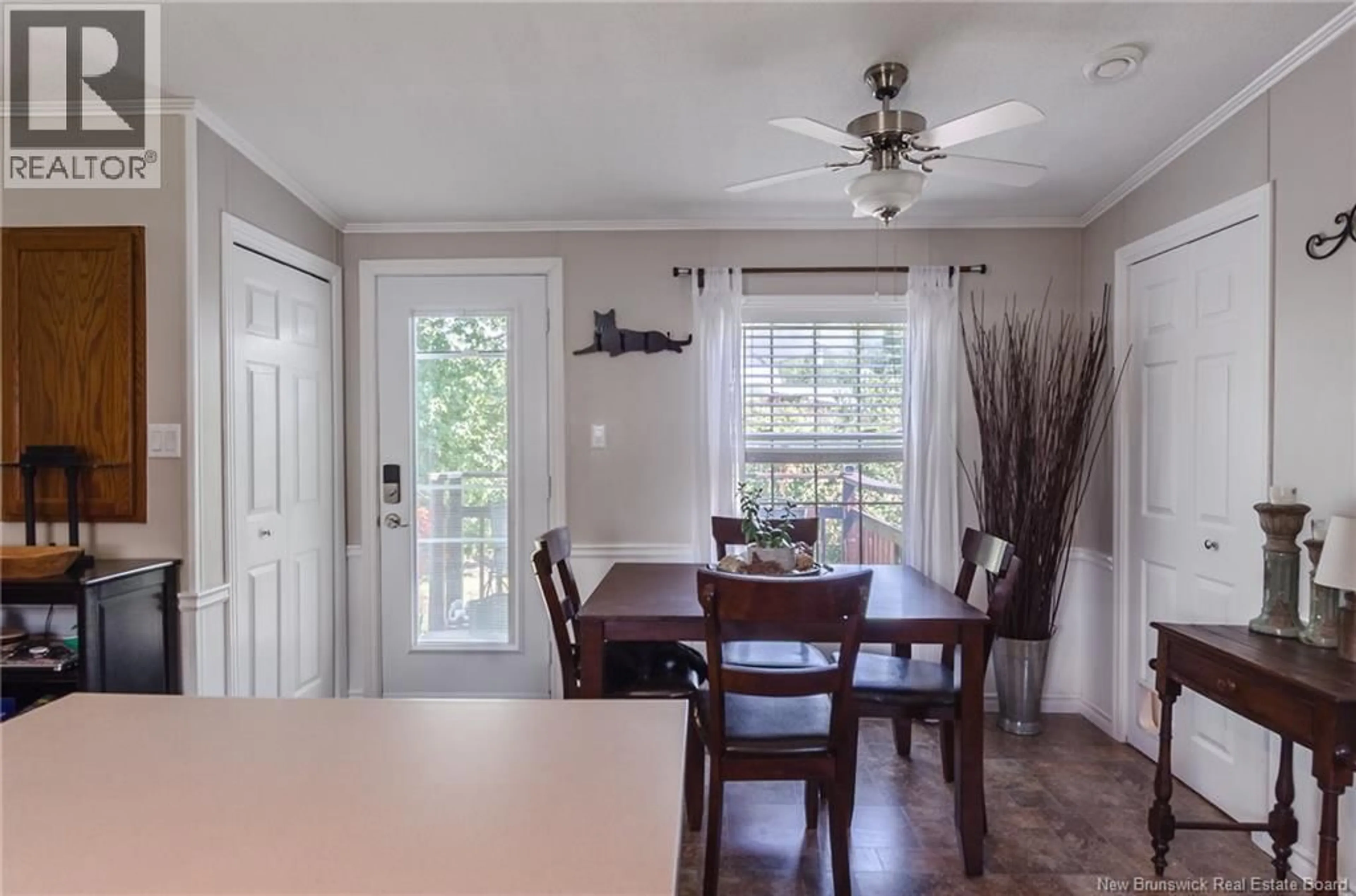 Dining room, wood/laminate floor for 14 SEVENTH STREET, Quispamsis New Brunswick E2G1V8