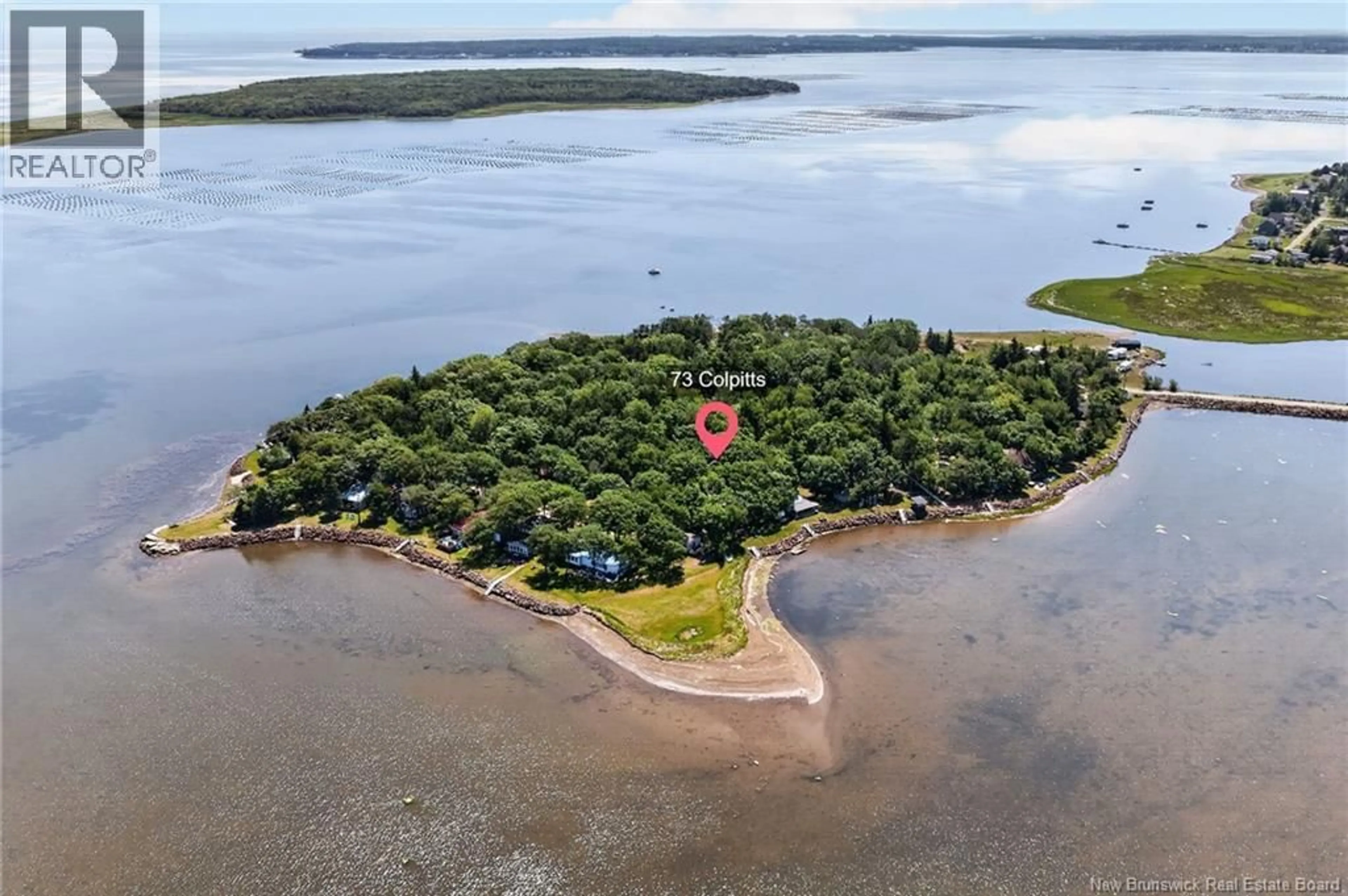 A pic from outside/outdoor area/front of a property/back of a property/a pic from drone, water/lake/river/ocean view for 73 COLPITTS STREET, Cocagne New Brunswick E4R2G7