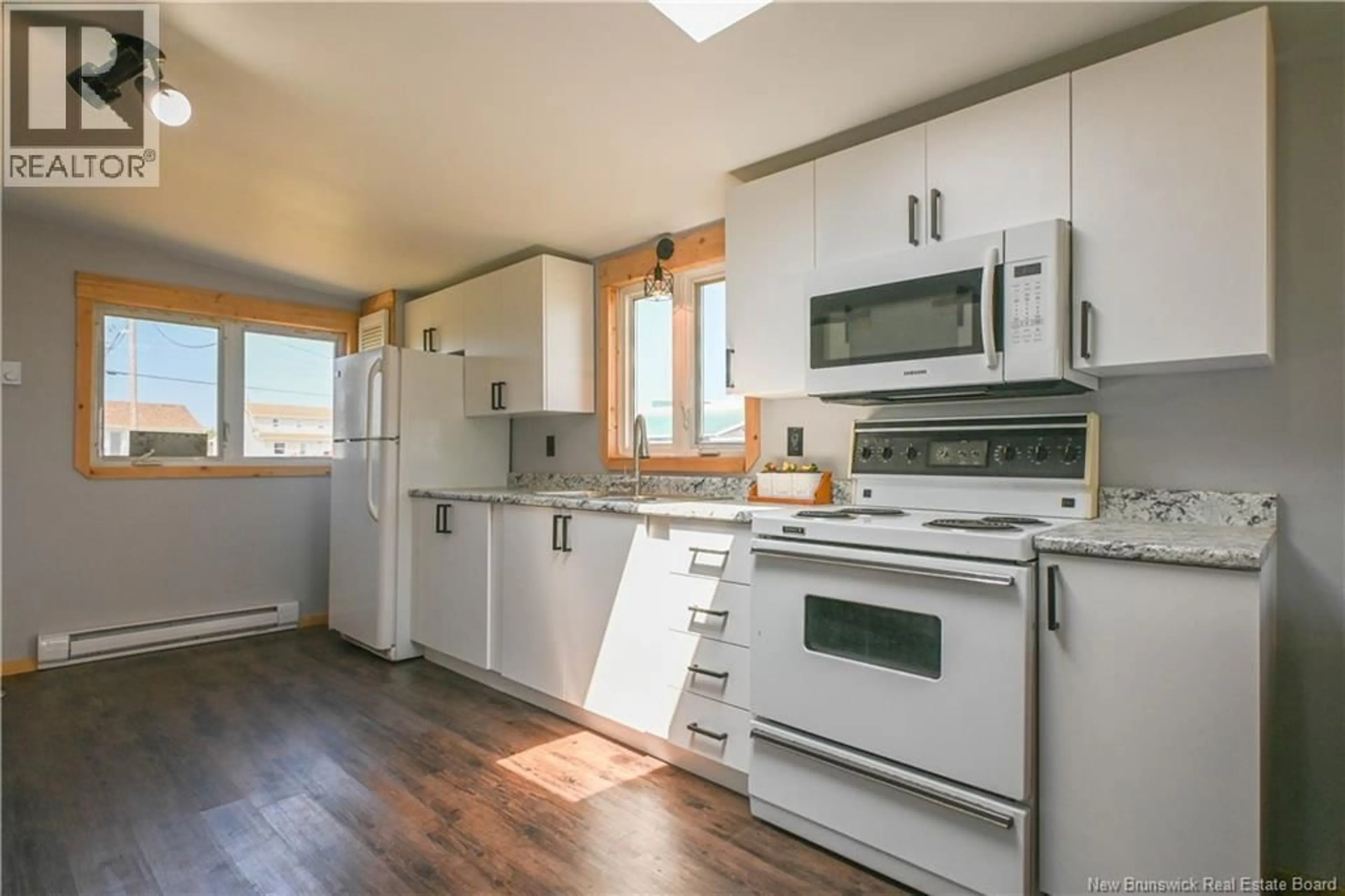 Open concept kitchen, wood/laminate floor for 1990 CHATILLON STREET, Maisonnette New Brunswick E8N2A2