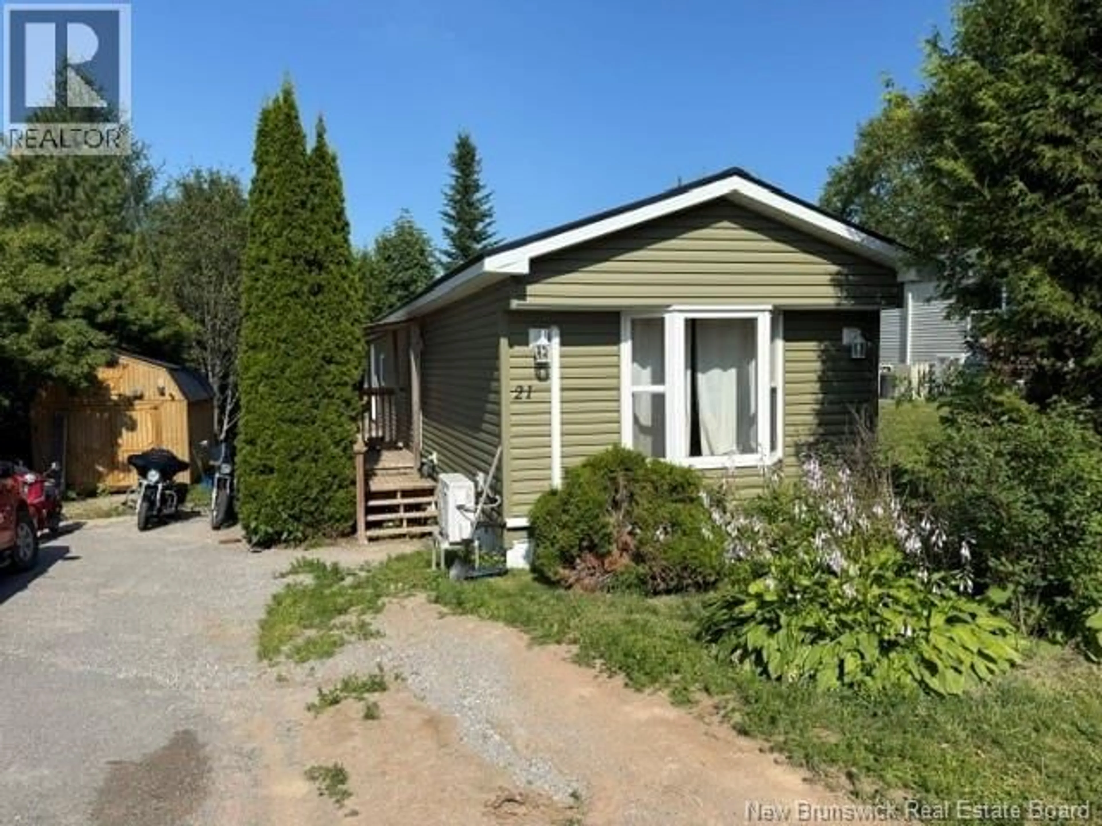 Home with vinyl exterior material, street for 21 THIRD STREET, Quispamsis New Brunswick E2G1W7