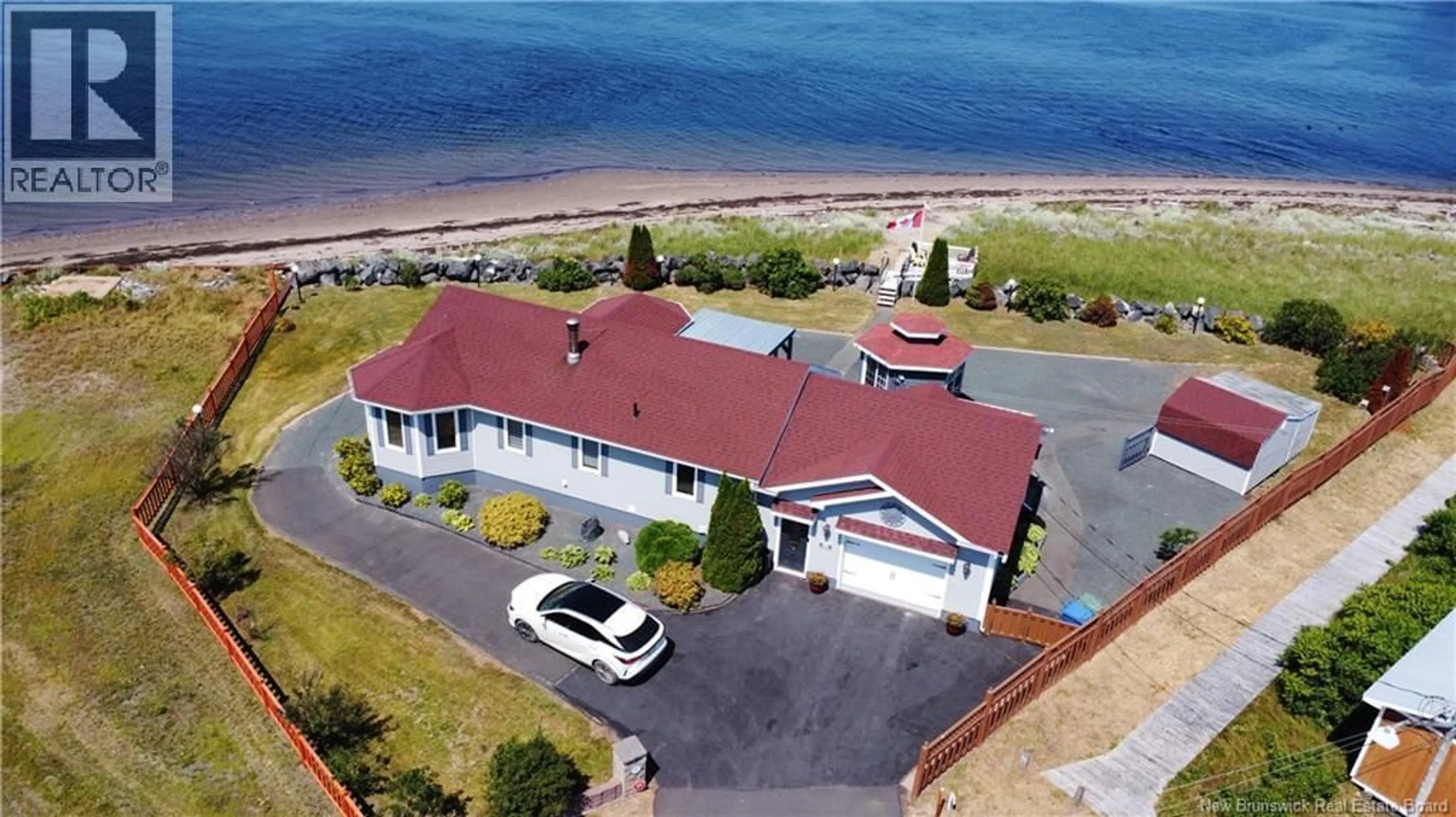 A pic from outside/outdoor area/front of a property/back of a property/a pic from drone, water/lake/river/ocean view for 25 BAYSHORE, Bathurst New Brunswick E2A6A4
